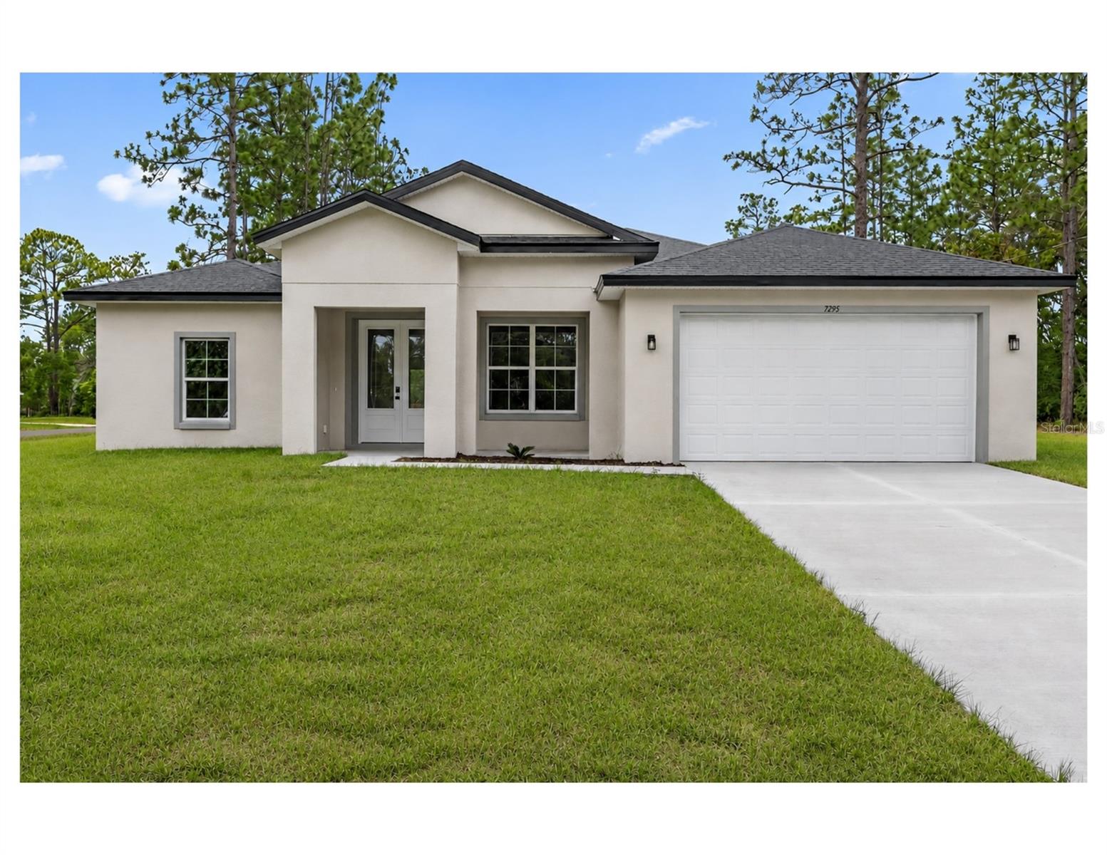 Discover modern living surrounded by the natural beauty of Florida's Nature Coast. This brand-new construction home sits on a spacious corner lot and offers the perfect combination of style, comfort, and privacy.
Inside, you'll find an open-concept floor plan filled with natural light, luxury vinyl flooring throughout, elegant quartz countertops, shaker-style cabinetry, and designer black fixtures. The gourmet kitchen features stainless steel appliances, abundant cabinet space, and a large island that flows seamlessly into the living and dining areas, making it ideal for everyday living and entertaining.
The primary suite serves as a private retreat with dual vanities, a spacious walk-in shower, and upscale finishes. Additional bedrooms provide flexibility for family, guests, or a home office. A dedicated laundry room, covered lanai, and oversized two-car garage add convenience and functionality.
Located in the desirable Citrus Springs area, this home offers easy access to Rainbow Springs State Park, Crystal River, Three Sisters Springs, and the Withlacoochee State Trail. Enjoy kayaking, boating, fishing, hiking, cycling, golf courses, and countless outdoor recreational opportunities just a short drive away. Shopping, dining, medical facilities, and everyday conveniences are also nearby, allowing you to enjoy peaceful surroundings without sacrificing accessibility.
A beautifully designed home in a growing community, offering quality construction, modern finishes, and the Florida lifestyle you've been looking for.
Some interior photos have been virtually staged to illustrate the property's potential layout and use of space. Furnishings, décor, and design elements shown in staged images are for marketing purposes only and are not included with the sale of the home.