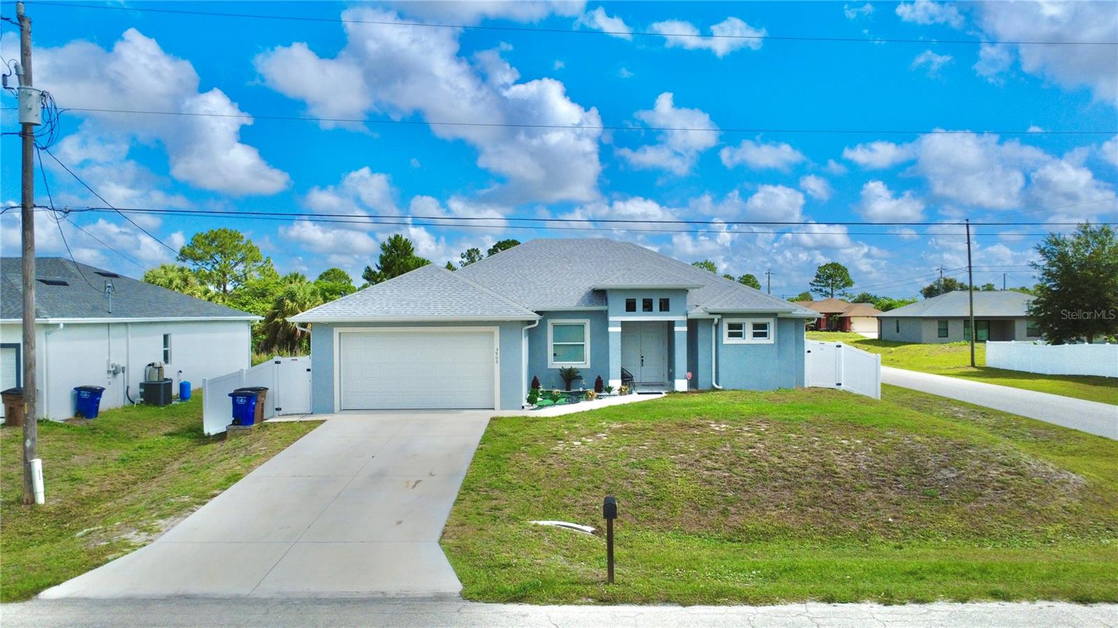 Experience affordable luxury in this exceptional 2022 custom built residence located in the heart of Lehigh Acres. Boasting over 2,300 square feet of elegant living space, this stunning property offers 4 spacious bedrooms, 3 beautifully designed bathrooms, and a private mother in law suite perfect for guests or multigenerational living.Situated on a fully fenced corner lot, this home welcomes you with soaring ceilings, modern finishes, and an impressive open concept layout designed for both comfort and sophistication. The open style kitchen seamlessly connects to the expansive living and dining areas, creating the perfect atmosphere for entertaining and everyday luxury living.
The primary suite is a private retreat, featuring generous space and a spa inspired bathroom designed for relaxation. The two additional bedroom and bathroom has been thoughtfully crafted with modern elegance and functionality in mind.
Step outside to a spacious backyard with endless possibilities , design your dream pool, create a tropical outdoor oasis, or simply enjoy the peace and privacy this property offers.Combining style, space, and versatility, this remarkable home delivers the perfect blend of luxury and convenience. Don’t miss the opportunity to own one of Lehigh Acres’ most impressive homes. Schedule your private showing today.