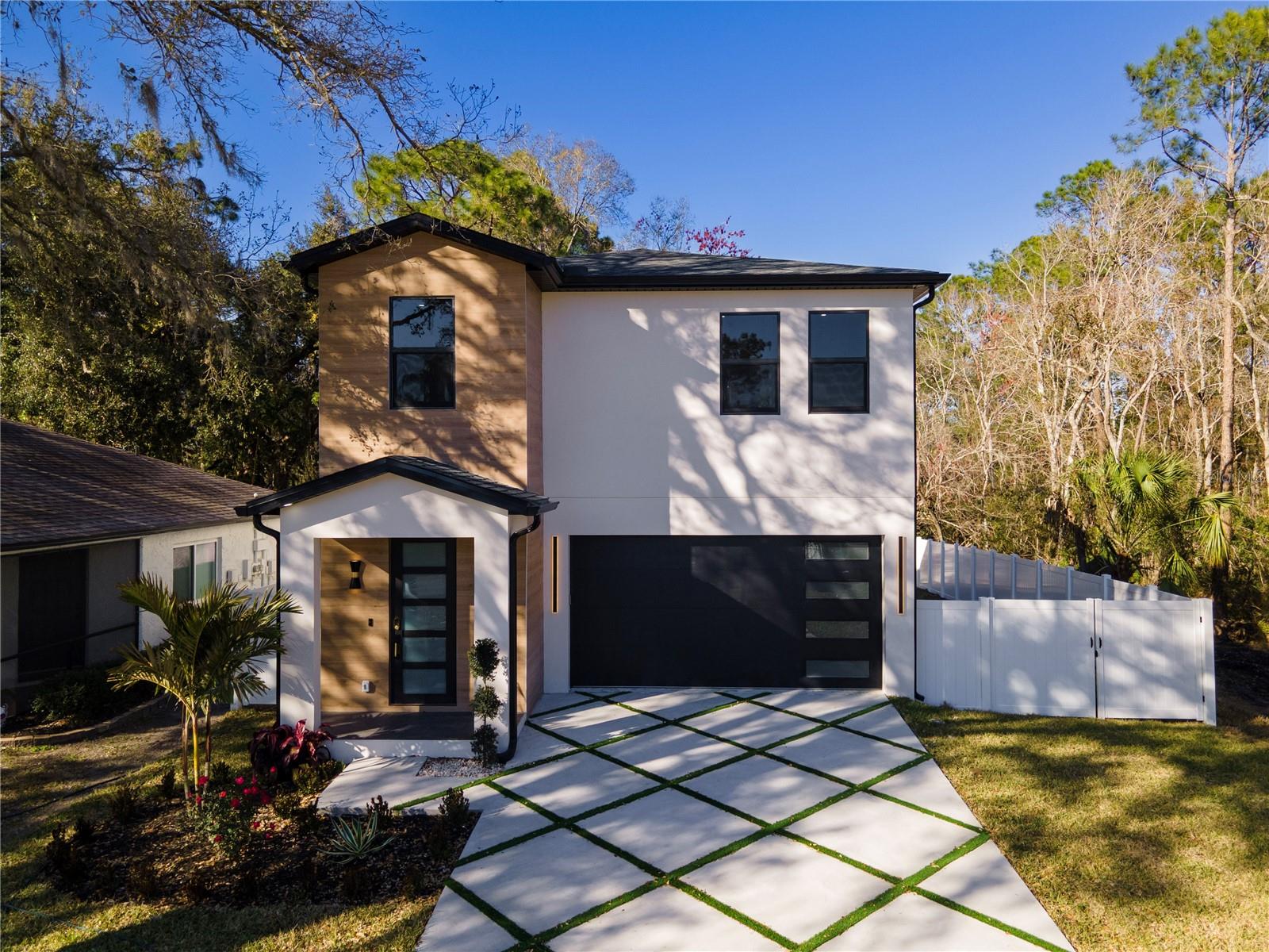 Welcome to 7609 Amherst Street, a stunning brand-new Modern Farmhouse designed with today's buyer in mind. This thoughtfully crafted 4-bedroom, 2.5-bath residence combines timeless architecture with modern finishes, offering the perfect blend of style, comfort, and efficiency.

Step inside to discover an open-concept floor plan featuring soaring ceilings, luxury finishes, designer lighting, premium cabinetry, quartz countertops, and spacious living areas ideal for both everyday living and entertaining. The chef-inspired kitchen seamlessly connects to the dining and living spaces, creating a warm and inviting atmosphere throughout the home.

Built with quality construction and energy efficiency at the forefront, this home offers the peace of mind of a comprehensive 1-2-10 Builder Warranty, low-maintenance living, and lower insurance costs often associated with new construction. Every detail has been carefully selected to provide durability, functionality, and long-term value.

Enjoy the freedom of homeownership without the burden of HOA fees or CDD assessments. Conveniently located near shopping, dining, major roadways, top-rated schools, and everything Tampa has, this is a rare opportunity to own a move-in-ready new construction home in an established area.

To make homeownership even more attainable, qualified buyers may take advantage of a seller-sponsored temporary interest rate buydown program, helping reduce monthly mortgage payments during the first years of ownership. Ask for details on current builder incentives and financing options.

Why settle for an older home that requires costly updates and maintenance when you can enjoy the benefits of brand-new construction, modern design, energy efficiency, low maintenance, lower insurance costs, and warranty-backed peace of mind from day one?

No HOA. No CDD. Brand-New Construction. Builder Warranty Included.

Schedule your private showing today and experience the difference of new construction living.