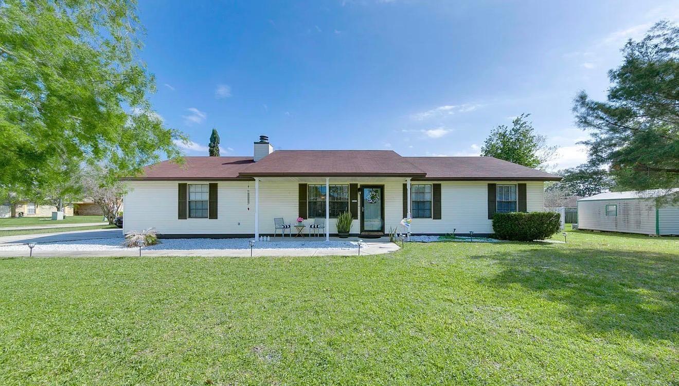 Welcome to your Florida paradise!

Don't miss this beautifully remodeled 3-bedroom, 2-bathroom home situated on a desirable corner lot with NO HOA and NO CDD fees.

The home features a stunning, fully renovated kitchen with granite countertops, a custom tile backsplash, and modern finishes. Both bathrooms have been tastefully remodeled with stylish upgrades, while durable ceramic tile flooring runs throughout the home.

The open-concept layout is perfect for entertaining, featuring a cozy wood-burning fireplace that adds warmth and charm to the living space.

Step outside to your spacious, fully fenced backyard, complete with a brand-new outdoor kitchen—perfect for family gatherings, weekend barbecues, or simply relaxing and enjoying the Florida lifestyle.

Additional highlights include a spacious two-car garage, offering plenty of room for parking, storage, and hobbies.

If you've been searching for a home that combines comfort, style, and exceptional outdoor living, this is the one. Everything you need to create your own Florida paradise is right here!
