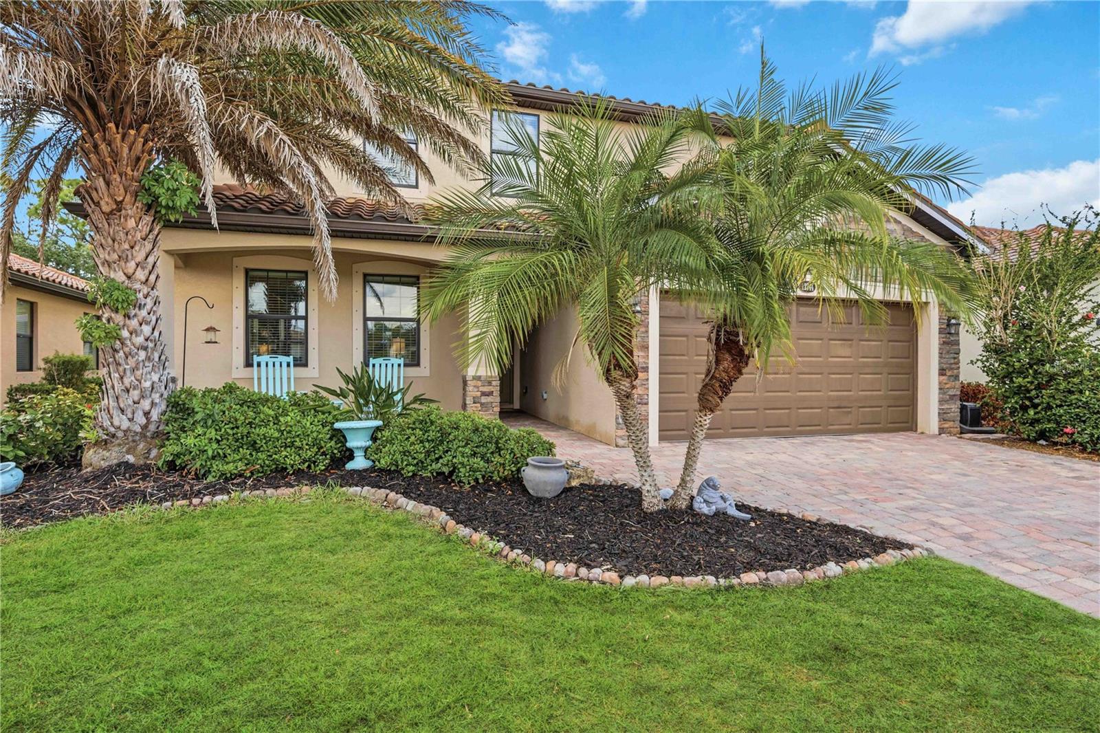 RARELY AVAILABLE MULTI-GENERATIONAL LIVING WITHOUT SACRIFICING STYLE OR PRIVACY. Located in the highly sought-after Gran Paradiso at Wellen Park, this impressive 5-bedroom, 3.5-bath heated-saltwater pool home offers an exceptional private guest retreat perfectly suited for multi-generational living, extended family, long-term guests, or that child who is ready to sprout wings with a little support! Thoughtfully designed for both privacy and connection, the retreat features its own entrance from the front porch, direct pool access, an efficiency kitchen & dining, spacious living area, a 14 x 15 bedroom with walk-in closet, a full bath, and stackable laundry while still seamlessly connected to the main home. Upon entering the primary residence, you’ll find a beautifully appointed, open-concept living area & powder bath. The kitchen showcases quartz countertops, stainless steel appliances, and effortless indoor-outdoor flow to the heated-saltwater pool and expansive paver lanai overlooking a tranquil greenbelt for added privacy. On the upper level, you’ll find a huge 17 x 19 ft. primary bedroom and ensuite complete with double vanities, separate tub, and walk-in shower. The amazing closet is literally a room of its own, sized at 7 x 15. Three additional guest bedrooms, another full bath, a separate laundry, and a versatile loft/flex space ideal for a media room, home office, or play area complete this level. The tandem 3-car garage has room for bikes, beach gear, extra storage, and even the golf cart that can convey. For added peace of mind and potential savings, the home is located in an X flood zone, where flood insurance is generally not required by lenders. Gran Paradiso residents enjoy an amenity-rich lifestyle featuring a resort-style pool and spa, clubhouse, fitness center, tennis, pickleball, playground, and countless social activities. The HOA includes lawn care, irrigation, cable, and internet. Conveniently located near CoolToday Park, Downtown Venice, Gulf beaches, dining, shopping, and all the excitement of Wellen Park. Schedule your showing today!
