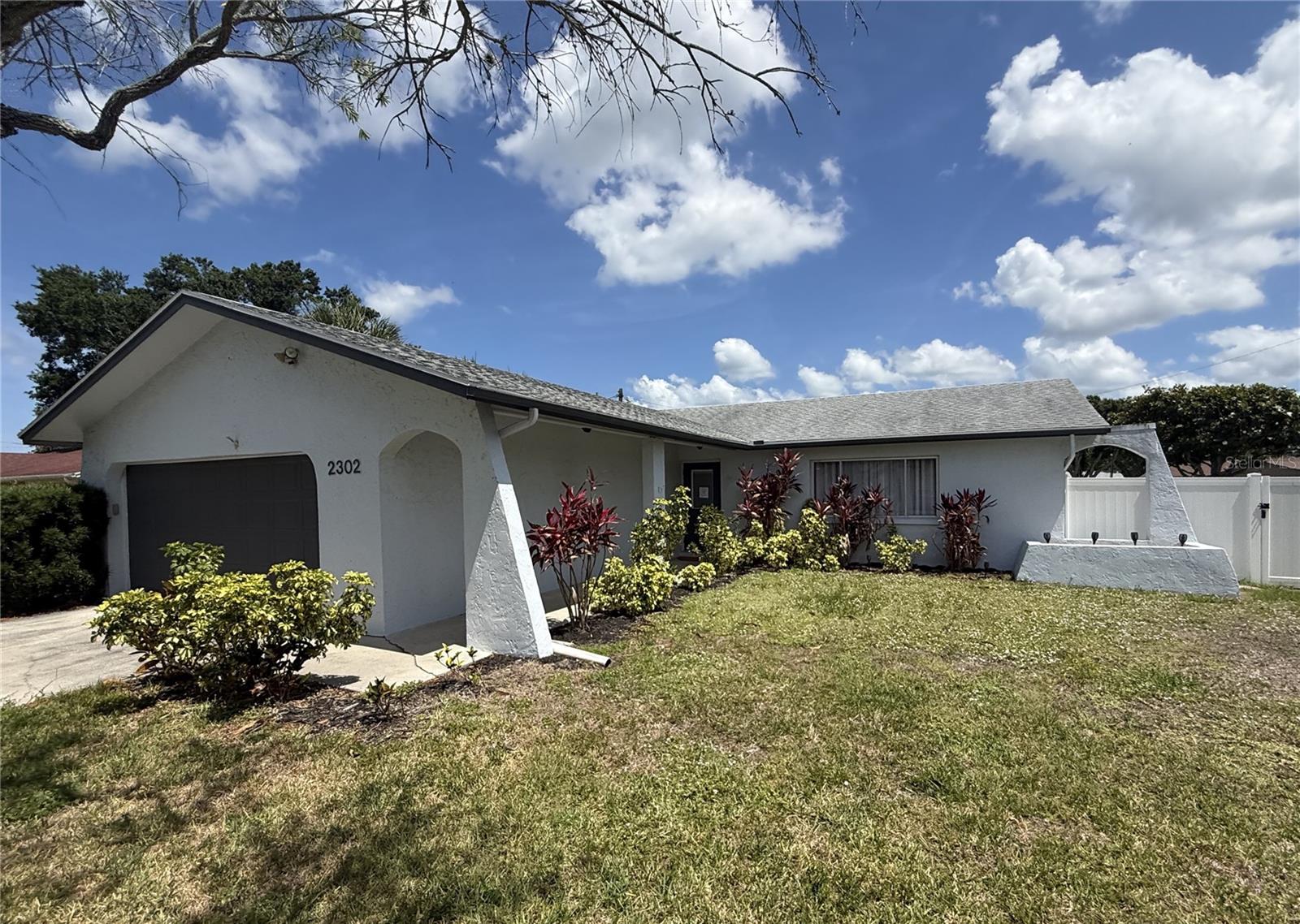 Charming Pool home in Palmetto with NO HOA or CDD! This home has much to offer with 2 bedrooms, 2 bathrooms, 1196 square feet and fenced corner lot! The open concept floorplan brings you directly from the front door into the spacious living and dining room. The step-saver kitchen is just off the dining area and has been updated with modern white cabinets, quartz counters and modern subway tile backsplash with a cute window over the sink that looks over the pool and backyard. The primary suite is situated off the living room and includes closet, vanity, step in shower and sliding doors that lead out to the pool. The secondary bedroom is just beyond with full bathroom. No HOA, no CDD and centrally located close to the interstate, shopping, restaurants and beaches. It's good to be home. This property may qualify for Seller Financing (Vendee).