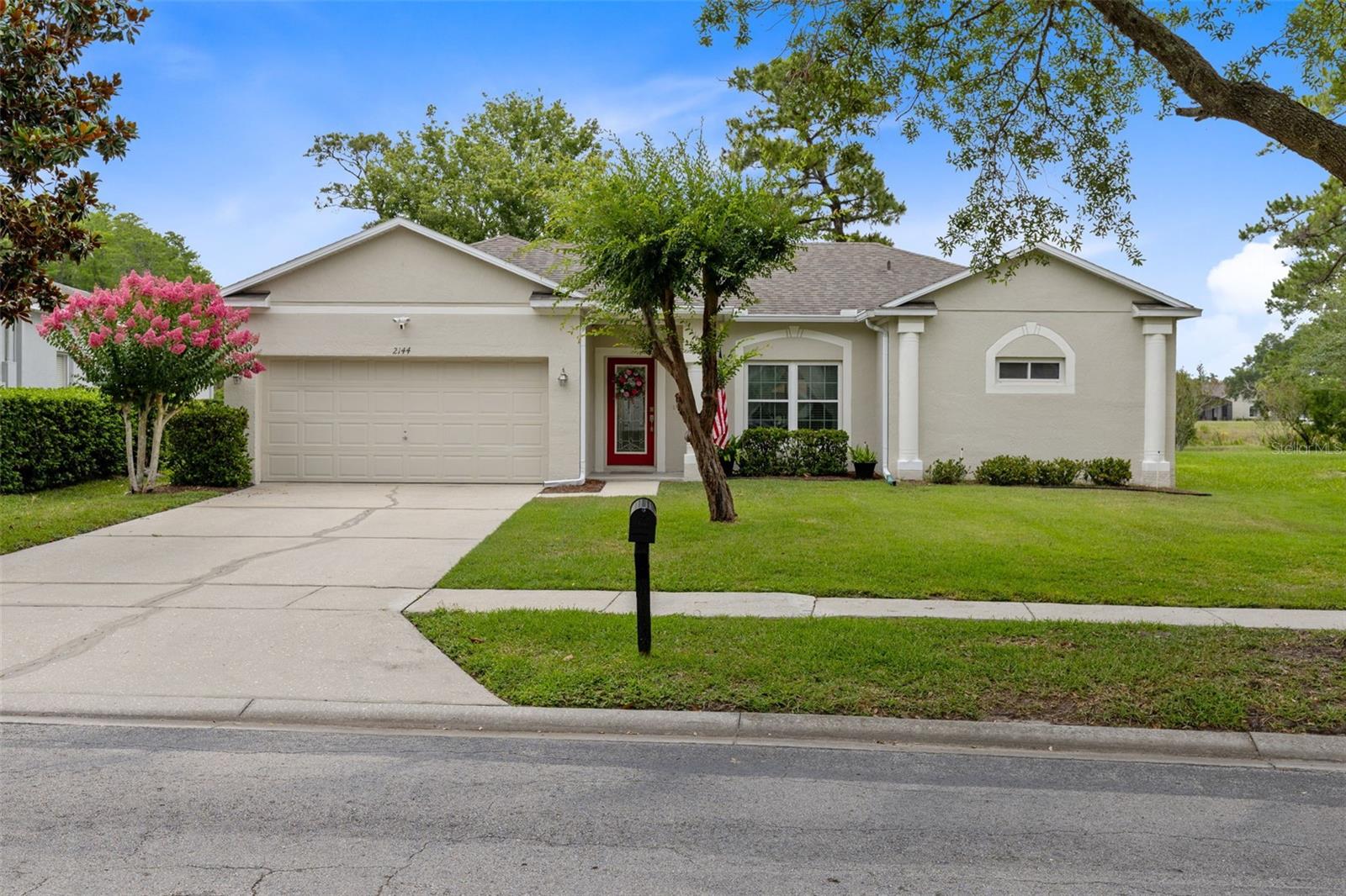 Nestled on a homesite just shy of a quarter acre with picturesque pond and golf course views, this beautifully maintained 3 bedroom, 2 bath home offers the perfect blend of privacy, comfort, and outdoor living in the sought after gated community of Stoneybrook East. From the moment you arrive, you'll appreciate the spacious layout, soaring ceilings, abundant natural light, and impressive screened lanai overlooking the tranquil backyard setting. Pond and golf course views can be enjoyed from multiple rooms throughout the home, including the living areas, primary suite, secondary bedroom, and expansive lanai, creating a peaceful backdrop for everyday living.
The thoughtfully designed floor plan offers both formal and casual living spaces, including a living room, family room, formal dining room, and dinette area, providing plenty of room for entertaining and everyday living. Designed for both everyday living and entertaining, the kitchen offers a generous wraparound breakfast bar, extensive cabinetry, ample workspace, stainless steel appliances, closet pantry, and an oversized island that creates a natural gathering space for family and guests. The open concept design flows effortlessly into the surrounding living areas, while expansive windows showcase picturesque views of the pond, conservation, and golf course beyond.
The primary suite serves as a private retreat with beautiful backyard views, TWO CLOSETS including a walk in closet and an additional built in closet, plus an updated en suite bath featuring custom cabinetry, upgraded vanity countertops, a frameless shower, and a generously sized private water closet with exceptional space and comfort. The guest bathroom has also been updated with matching custom cabinetry and upgraded Oynx vanity countertops, creating a cohesive look throughout both bathrooms. The split bedroom floor plan provides privacy, with the secondary bedrooms located on the opposite side of the home.
Step outside and enjoy one of this home's standout features, an expansive 20' x 26' SCREENED LANAI overlooking the pond, golf course, and lush natural surroundings. Whether you're enjoying your morning coffee, entertaining guests, or simply unwinding after a long day, this outdoor living space is sure to become a favorite.
Major updates include NEW A/C (2025), ROOF (2019), PATIO RE-SCREENED (2026), EXTERIOR PAINTED (2019), DOUBLE PANE WINDOWS & SLIDERS, FRONT DOOR REPLACEMENT, and ENGINEERED WOOD FLOORING THROUGHOUT MOST OF THE HOME WITH NO CARPET. Additional features include outdoor plumbing, garage shelving and workbench, updated toilets, and more.
Located in Stoneybrook East, residents enjoy 24 HOUR MANNED SECURITY, HIGH SPEED INTERNET AND CABLE INCLUDED IN HOA DUES, plus outstanding community amenities including a JUNIOR OLYMPIC SIZE POOL with kiddie splash area, fitness center, lighted tennis courts, basketball courts, soccer and baseball fields, walking trails, multiple playgrounds, and more. Conveniently located near shopping, dining, major roadways, UCF, Waterford Lakes, and everything East Orlando has to offer.
With major updates already completed, breathtaking views, and an exceptional outdoor living space, this home offers a rare opportunity to enjoy one of Stoneybrook East's most desirable settings. Upgrade list, floor plan, 3D photos survey & video tour available upon request. Schedule your private showing!