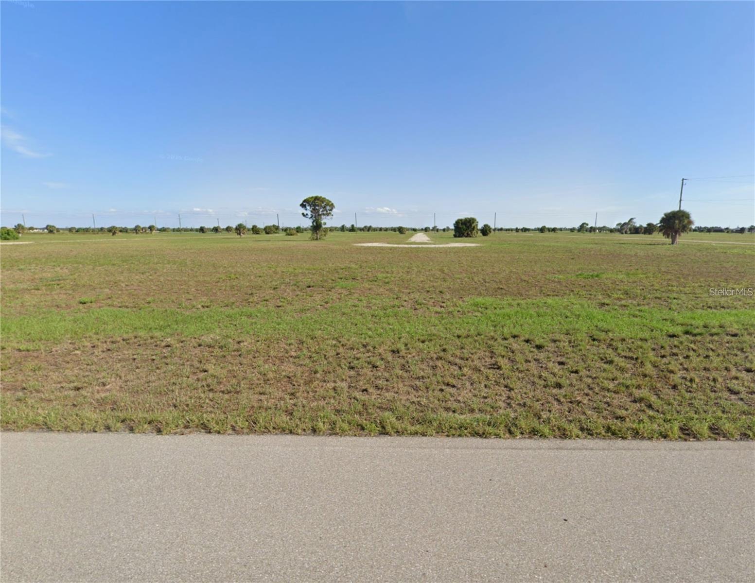 Excellent corner lot opportunity in the desirable community of Rotonda Meadows & Villas in Placida, Florida! Located at 1 Croton Ct, this oversized corner residential lot offers additional flexibility and curb appeal for your future dream home or investment property. Enjoy a peaceful neighborhood with paved roads, public water and sewer availability, and convenient access to Boca Grande beaches, golf courses, boating, fishing, marinas, shopping, and dining. Surrounded by beautiful natural scenery and newer homes, this property provides privacy, convenience, and strong future appreciation potential. Whether you are looking to build now or invest for the future, this is a fantastic opportunity to own a premium piece of Florida paradise!