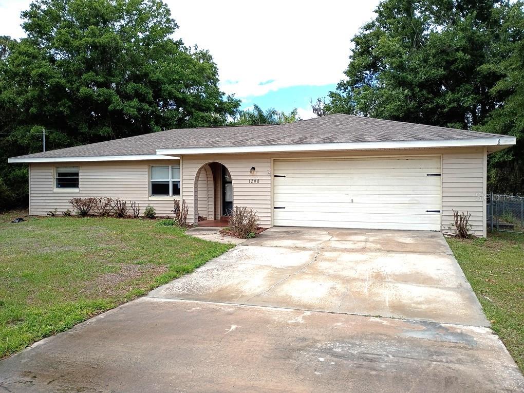 This 3-bedroom, 2-bath single-family home offers 1,649 square feet of comfortable living space with a 2-car attached garage. Situated on a freshwater canal with direct access to Lake Sebring, you’ll enjoy peaceful water views right from your backyard, which is partially fenced for added privacy.

The home features durable concrete construction with vinyl siding, and a functional layout that includes a spacious living room, separate family room, and a bright kitchen complete with stainless steel appliances, a closet pantry, and a cozy dinette area. The primary suite offers an en-suite bathroom, while the second and third bedrooms and hallway bath provide comfortable accommodations for guests or family.

Ceramic tile flooring runs throughout the main living areas, with vinyl flooring in both bedrooms for easy maintenance. Ceiling fans are installed in the living room, family room, and primary bedroom to enhance comfort. Washer and dryer hookups are conveniently located in the garage.

Enjoy tranquil canal views and the Florida lifestyle from your own backyard—perfect for relaxing or entertaining!