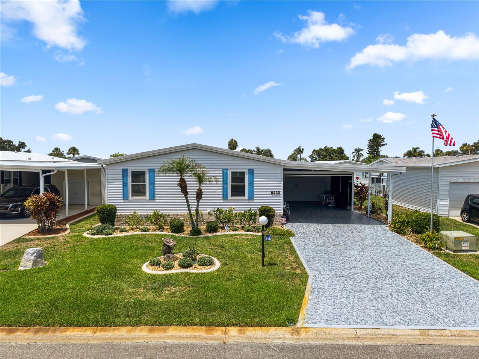 Move right in and enjoy worry-free Florida living in this beautifully updated 3-bedroom, 2-bath home offering approximately 1,680 square feet of comfortable living space with an attached 2-car garage and an additional 2-car carport featuring a unique remote-controlled privacy screen enclosure that provides privacy while still allowing you to enjoy the outdoors.

The current owners have invested extensively in this home, making it truly move-in ready. Major improvements include a new roof on the home, lanai, garage, and carport (2022), new double-hung tilt-in windows (2022), new HVAC system (2023), new flooring throughout (2021), a completely remodeled custom kitchen with new appliances (2022), new Rheem 40-gallon water heater (2022), new washer and dryer (2024), a custom-built living room fireplace (2021), new window coverings throughout (2021), an epoxy-coated garage floor (2023), an inspected vapor barrier, and an updated hurricane tie-down system for both the home and carport.

Inside, you'll appreciate the spacious split-bedroom floor plan, soaring cathedral ceilings, crown molding throughout, and an abundance of natural light. The primary suite features a walk-in closet with built-in storage and a beautifully updated bath with a ceramic tile walk-in shower. The spacious kitchen offers abundant cabinetry, an oversized walk-in pantry, and an indoor laundry room, creating a home that's as functional as it is beautiful.

Located in the highly desirable 55+ community of Imperial Lakes Estates, residents enjoy an active lifestyle with two heated swimming pools, spa, tennis courts, pickleball, bocce ball, shuffleboard, horseshoes, a scenic 65-acre lake, and an impressive 12,000-square-foot clubhouse featuring a full kitchen, billiards room, library, stage, dance floor, and a full calendar of social activities and community events.

Convenience is another outstanding feature of this location. You're just minutes from Publix, Ellenton Premium Outlets, a growing selection of new restaurants, shopping, medical offices, and Interstate 75. The area continues to experience tremendous growth with the new hospital under construction on Moccasin Wallow Road, along with additional retail, restaurants, and commercial development that continue to make Parrish and North Manatee County one of the fastest-growing areas on Florida's Gulf Coast.

If you're looking for a beautifully updated home where the major improvements have already been completed, in an active community with exceptional amenities and a location that's close to everything, 8433 Regal Way deserves a place at the top of your list.