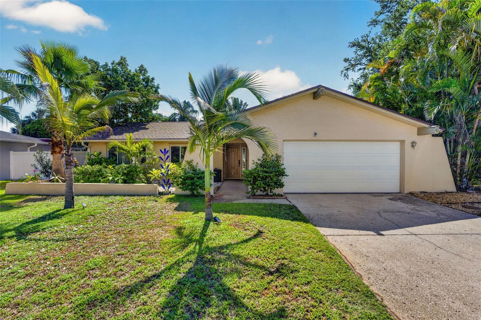 Welcome home to 9259 119th Way, a stunning 4-bedroom, 2-bathroom pool home perfectly situated in the heart of Seminole. This property beautifully pairs peace-of-mind structural integrity with an array of premium, modern comforts. Located within an exceptionally rated school district, this home is ideal for anyone prioritizing top-tier education alongside an active, outdoor lifestyle. Walk right over to the nearby Seminole Wilcox Athletic Complex for weekend sports and recreation, or take a quick drive—under 10 minutes—to sink your toes into the world-class, sugar-sand Gulf beaches. Not to mention your fenced in back yard features a door that opens right up into the Pinellas trail! Step inside to discover a beautifully designed interior featuring newer, sleek kitchen appliances and a fully remodeled master bathroom that serves as your own private oasis. Efficiency and smart-home integration take center stage here: the home boasts a high-efficiency tankless water heater, a brand-new water softener system, and a 4th Generation Nest Thermostat. The robust HVAC system is 6 years young and features new completely sealed ductwork in 2025, an additional return air line for optimal air balance, and a built-in UV air purification system.  The insulation was also updated and refreshed in 2025.  

The exterior of this property is a true tropical retreat. The screen-enclosed pool area features its own tranquil koi pond, creating the ultimate serene backdrop for morning coffee or evening relaxation. The pristine in-ground pool is powered by a brand-new variable-speed pool pump (replaced 2026) and comes complete with a top-of-the-line Dolphin pool vacuum for effortless maintenance. Relax under the shade of your newly updated landscaping with majestic palm trees & mango fruit tree.  This home has major curb appeal with additional LED lighting added around the front trim of the home as well, illuminating your evenings. A huge structural bonus includes a brand-new roof installed in 2025 and a newly added 100-gallon above-ground propane tank (2025), perfect for powering your tankless water heater and whole house generator!  The electric panel was updated in 2024 so this home has all of your major systems in up to date shape!  Not to mention there's also an exterior shed for additional storage.  With its unbeatable location, pristine finishes, and top-to-bottom utility upgrades, this turn-key Seminole paradise won’t last long. Schedule your private showing today!