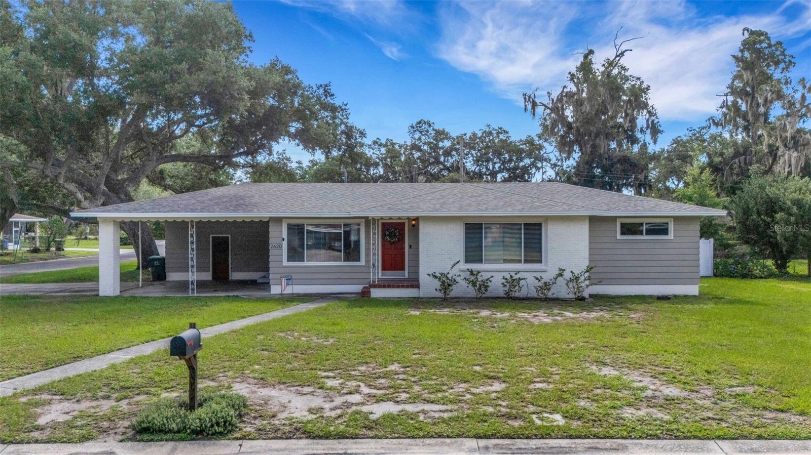 Welcome home to this beautifully maintained 3-bedroom, 1.5-bath residence that blends timeless character with thoughtful updates and a great in-town location. Built in 1958, this charming home features original hardwood flooring in the living room and all three bedrooms, creating warmth and character throughout. Fresh interior paint, plaster walls and ceilings, crown molding, 5-inch baseboards, solid-core interior doors, updated light fixtures, and double-pane windows with blinds add to the home's appeal.

The kitchen and dining room combination offers an inviting space for everyday living and entertaining, featuring raised-panel cabinetry, granite countertops, and a gas range. The hallway showcases decorative wainscoting, built-in shelving, and additional storage for added convenience.

The remodeled primary bathroom features quartz countertops with dual sinks, ceramic tile flooring, and a new tub with shower. A spacious laundry room includes a convenient half bath, and the brand-new washer and dryer are included with the sale. Additional washer and dryer hookups are also available in the carport storage room.

Major updates provide peace of mind, including a new shingle roof installed in May 2026, HVAC system replaced in 2015 with all new ductwork, and updated CPVC plumbing throughout the home.

Outside, you'll find a large backyard enclosed with durable white PVC fencing, offering plenty of space for pets, play, gardening, or outdoor gatherings. A detached utility shed provides additional storage, while the two-car carport offers covered parking and convenience.

If you're looking for a move-in-ready home with classic charm, quality updates, and plenty of outdoor space, this property is one you won't want to miss.
