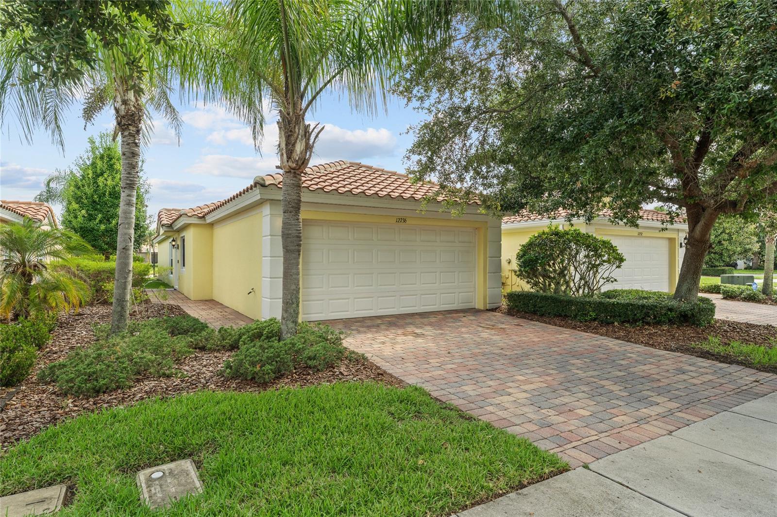 Indulge in refined waterfront living at VillageWalk at Lake Nona, an exclusive 24 hour guard-gated community celebrated for its tranquility,
resort-style amenities, and unmatched convenience. This beautifully maintained 3BR/2BA residence showcases an impressive 38' x 14' open living and dining area with sweeping canal views, complemented by an expansive 20' x 19' brick/paver lanai ideal for serene outdoor living. Lovingly cared for and truly move-in ready, the home offers a low maintenance lifestyle with cable TV, internet, and lawn care included. Residents enjoy a world class amenity collection, including a state-of-the-art fitness center, heated resort-style pool, lap pool, six lighted tennis courts, basketball court, tot lot, lakeside gazebo, and a grand clubhouse with ballroom, meeting rooms, café/wine bar, hair salon, and even a private community gas station. Miles of scenic, paved walking and biking paths wind gracefully along the waterways and picturesque bridges. Perfectly positioned in the heart of Lake Nona—5 minutes to Medical City, minutes to SR 417, less than 10 minutes to Orlando International Airport, and close to premier shopping, dining, schools, and hospitals—this home offers an exceptional blend of luxury, serenity, and convenience. A rare opportunity to own in one of Orlando’s most distinctive and sought-after communities.