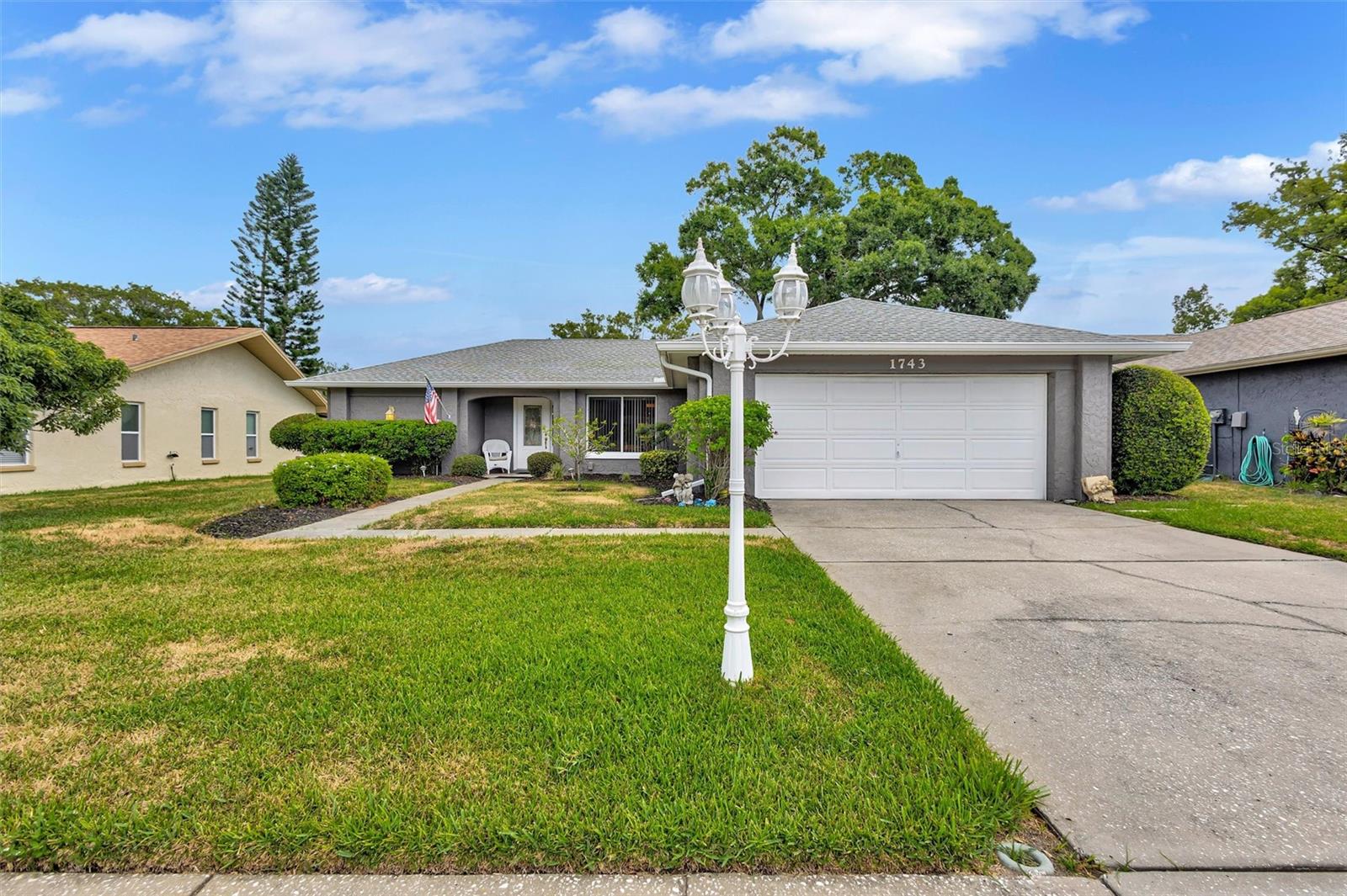 Impeccably maintained and beautifully updated, this spacious home is sure to impress from the moment you walk through the door.  With its fresh finishes and modern updates, it has the look and feel of a new construction home without the wait.  The bright, open living area is surrounded by windows that fill the space with natural light, creating a warm and inviting atmosphere.  Just off the primary bedroom is a versatile bonus room, perfect for a home office, sitting room or hobby area.  The updated kitchen is both stylish and functional, featuring newer appliance and a 2015 A/C system.  Step outside to a welcoming patio that's ideal for relaxing or entertaining, Throughout the home, you'll find thoughtful upgrades, including beautiful bamboo flooring in the dining area, wood-look porcelain tile in the bedroom a new hot water heater and a 2015 A/C.  Step outside to a welcoming patio that's ideal for relaxing or entertaining family and friends.  Located in a highly desirable area, this move-in ready home offers the perfect combination of comfort, quality and convenience.  All that's missing is the new owner. You can golf free and any of the three Golf courses or enjoy Pickleball or Tenns.  Take a ride on one of the Pontoon boats that will take you to Tarpon Turtle and an enjoyable ride on the lake.  Join the Bocce ball, shuffleboard or bowling groups or come dance at one of the Chef provided dinner dances.  Take a dip ine one of the many pools or join one of the many clubs.