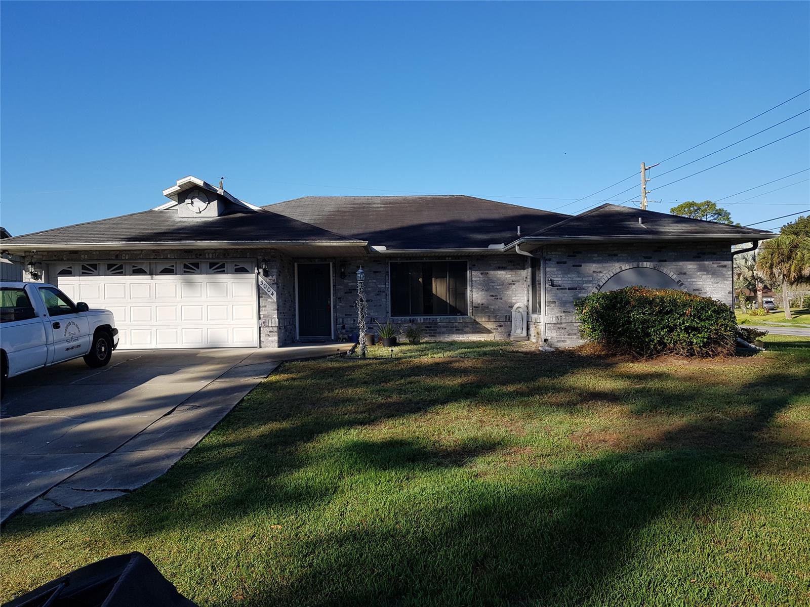 WOW! What an opportunity!!! Not only does this AWESOME HOME offer 4 bedrooms, 2 bathrooms, a huge open floor plan, but you walk into a great room with cathedral ceilings that open into a GOERGEOUS kitchen with enough counter space for the whole clan! Stainless steel appliances & Amazing custom cabinetry. Look across the kitchen into another vaulted ceiling room, a cozy family room with a beautiful wood burning fireplace as a center focal point! Also, this Move-In ready home is Close to the Beach, 1/2 hr. to Daytona, or jump on I95 and hit Orlando. Plus, there is ROOM for everything! A Huge 2 car garage, extra wide parking pad, fenced back yard with room for chickens, bunnies or young ins! The enclosed Florida room is currently used as a working office has an exit to the back yard, featuring a quaint private patio of pavers. Build your outdoor kitchen and there is already a place to grill & chill under the stars! This is Truly a MUST SEE! ;Water: City
