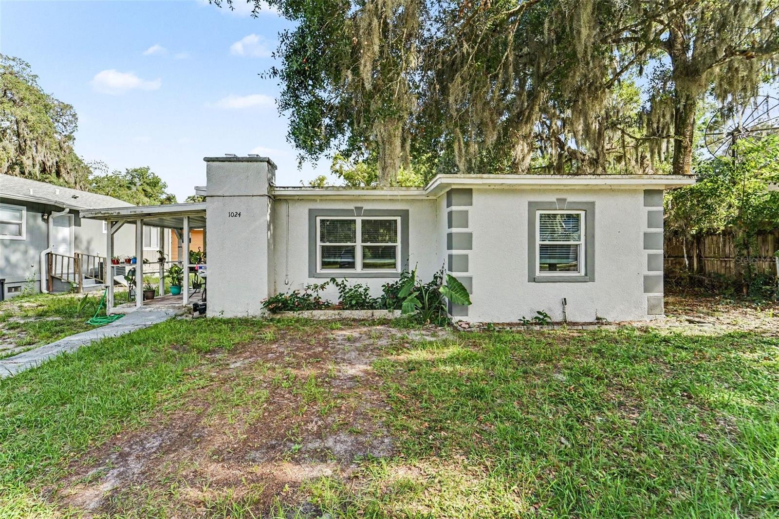 Welcome home to this beautifully renovated Mount Dora bungalow where charm, comfort, and peace of mind come together. From the moment you arrive, you'll appreciate the warm, welcoming feel that makes this home truly special. Inside, natural light fills the open living spaces, highlighting the updated finishes and easy-maintenance flooring throughout. The thoughtfully renovated kitchen offers stylish cabinetry, modern fixtures, and a bright space to prepare meals and gather with family and friends. The updated bathroom continues the home's fresh, move-in-ready appeal. Major improvements including the roof, windows, plumbing, electrical, stucco, and more provide confidence for years to come. Whether you're enjoying a quiet morning coffee on the porch, hosting friends, or exploring all that historic Mount Dora has to offer, this home delivers the perfect blend of affordability, convenience, and low-maintenance living just minutes from downtown shops, restaurants, parks, and waterfront attractions.