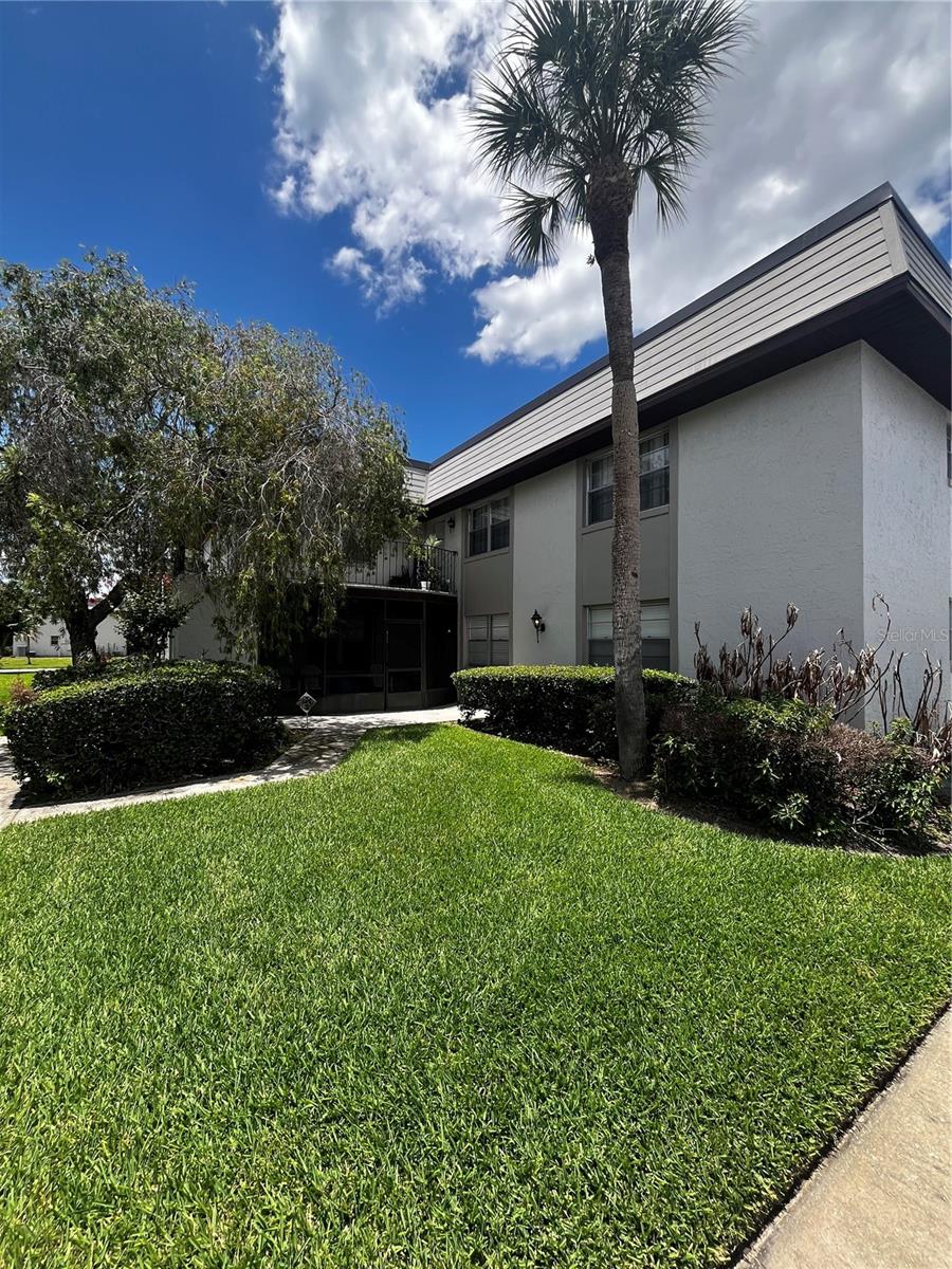 Welcome home to this tastefully renovated 2/2 second floor condo located in the sweet spot of bustling Winter Garden Florida USA. Just about everything was updated in 2024 to include the kitchen with beautiful stainless appliances, granite countertops, cabinetry & lighting. Fresh paint throughout. New laminate flooring & baseboards in 2025, there is no carpet. The split bedroom layout is perfect for privacy while the primary bedroom is spacious with a walk in closet and ensuite bathroom. The 2nd bedroom includes a custom built closet and shelving providing ample storage options. The 2nd bathroom is adjacent to the 2nd bedroom. The washer and dryer hookups are located just off the kitchen providing easy access.  This unit is conveniently located near the center of the community, just steps from the clubhouse, pool and mail areas.  It also includes 2 designated parking spots just outside the unit.  Windtree Gardens is situated in a fabulous area of Winter Garden providing quick access to all major roadways including the turnpike, 408 and 429.  It is also just minutes from Historic Downtown Winter Garden including all that Plant Street has available, boutique shops, outdoor dining, Award Winning Farmer's Market, the very popular West Orange Trail and splashpad for the little ones. Bonus..there is a Starbucks near the entrance to the community. This unit is ideal for a starter home, a second home or an investment property.  Schedule your showing soon as this one is sure to fly off the shelf.