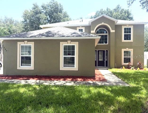Feast your eyes on this Move-in Ready home in the Lake Doe subdivision. Welcome to this refreshed 4BR/2.5BA two-story home with fresh interior paint and new carpet throughout the second level. Real bamboo floors and new luxury vinyl plank adorn the first floor. The granite kitchen anchors the main level, flanked by a formal dining room with beautiful chair railings and a flexible bonus room—perfect for an office, playroom, or living room. Elegant light fixtures are throughout the entire home. Upstairs, the expansive primary suite features a beautiful stall shower, a garden tub, and two walk-in closets. Convenience matters with a half bath down. New glass sliders lead out to the large screened patio and huge fully fenced backyard, including the storage shed. And the new windows bring in great natural light.   A 2-car side-entry garage plus an oversized 6-car driveway offer exceptional parking. Comfort, function, and style are just waiting for you! The Lake Doe subdivision is conveniently located near major expressways, hospitals, restaurants, and shopping. The Orlando attractions are just minutes away.