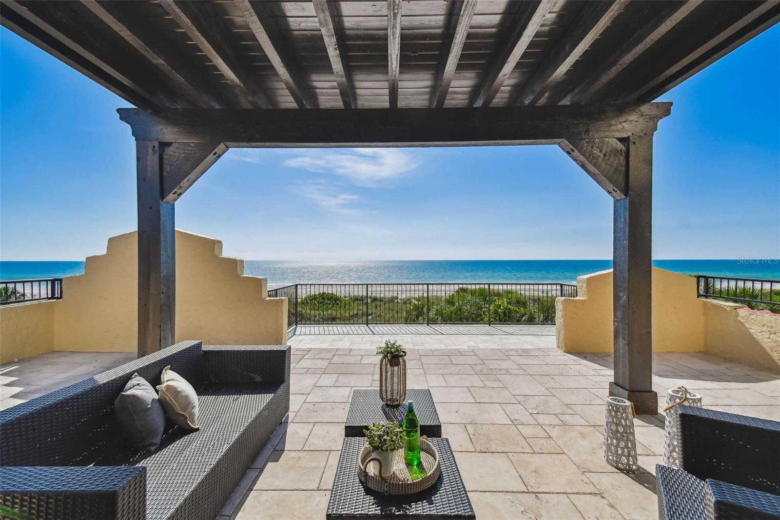 Classic Pass-a-Grille Beachfront Estate

A rare opportunity to own a 3-story seaside retreat in the heart of coveted Pass-a-Grille—a jewel of Florida's Gulf Coast.

This expansive beachfront estate offers 6,071 sq ft of elegantly designed living space, featuring 5 bedrooms, 5 full bathrooms, and 1 half bath, including a private additional dwelling unit ideal for guests or multigenerational living. 7,744 total square footage including balconies. Completely gutted and renovated in 2007! 

Crafted with timeless durability, the home showcases solid block and stucco construction, complemented by a roof with charming clay tile accents. Both the roof and exterior have been recently painted, sealed, and protected with a transferable warranty, ensuring peace of mind for years to come. Inside, multiple fireplaces, five zoned HVAC systems, and sun-drenched living areas with sweeping views of the beach elevate the coastal luxury experience.

Step outside to your own serene oasis—complete with a private pool and spa, lush landscaping, and direct beach access just steps from your door. Whether you're entertaining poolside or watching the sun melt into the Gulf from nearly every room, this home epitomizes the finest in beachfront living.

Welcome to St. Pete's Coastal Crown Jewel

Pass-a-Grille is the southernmost tip of St. Pete Beach, consistently ranked among the top beaches in the United States. This historic, laid-back community is known for its charming blend of Old Florida ambiance and upscale amenities. Here, you’ll find walkable streets, quaint shops, art galleries, open-air markets, and some of the area’s most beloved waterfront restaurants.

Just a short drive away, downtown St. Petersburg offers a vibrant arts scene, world-class museums, professional sports, and a dynamic culinary landscape. With its year-round sunshine, boating culture, and close-knit community spirit, St. Pete is more than a destination—it’s a lifestyle.

Whether you're looking for a private retreat, a family legacy property, or an entertainer’s dream with panoramic Gulf views, this Pass-a-Grille estate delivers the best of both tranquility and sophistication.