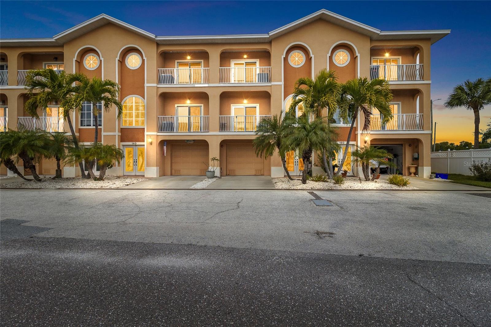 Mar Amante Townhomes –  Just 500 Steps to the Beach! Perfectly Positioned only one block from Gulf waters of Redington Beach, this beautifully built 3 bedroom + den, 3 bath Residential townhome offers approximately 2,500 square feet of spacious coastal living. Built with rare all-concrete block construction on all three levels, the home provides exceptional strength, sound insulation, storm resilience and peace of mind rarely found so close to the beach. A private elevator services every floor, offering effortless access and long-term convenience. High-impact windows on the south side of the unit add an extra layer of protection, while original windows remain on the north side. The main living level features an open-concept layout, with Crown Moulding and High Ceiling designed for both entertaining and relaxed beachside living. Indoor-outdoor living is a standout feature, with four private balconies, one off each bedroom and the one in the living room is screened. The primary suite is a true retreat, complete with a spa tub, generous proportions, and access to fresh coastal breezes. Additional highlights include oversized walk-in closets, plentiful storage throughout, and a dedicated laundry room for everyday ease. The enormous attached garage, approximately 1,000 square feet, comfortably accommodates three or more vehicles, along with ample room for a jet ski, small boat, bicycles, and all your beach gear—a rare and valuable feature in a beachside community. Mar Amante is an exclusive enclave of just six townhomes, offering a quiet, residential atmosphere with a beautiful heated community pool and lounge area. The pool was resurfaced in March 2026, this prject was already biudgeted for reflecting proactive and responsible association management. The association maintains over $50,000 in reserves, providing added peace of mind for owners. Major building updates are already complete, including a new roof in 2023 and exterior paint in 2021, ensuring that significant capital improvements have been addressed. Residents enjoy close proximity to two nearby town parks—one featuring a playground and outdoor fitness equipment, and another offering a scenic Intracoastal waterfront setting. 2 pets are welcome, making this home ideal for full-time residents or those seeking a spacious coastal retreat. HVAC and Water Heater were replaced in 2019, Water Softening System installed 2025, Elevator Cable & Shaft replaced 2025. Offered unfurnished, this townhome provides a blank canvas to create your ideal beachside escape. With its rare elevator access, solid construction, and prime location just steps from the beach, this is an exceptional opportunity to own in one of Redington Beach’s most desirable and low-density coastal communities. All room sizes approximate.