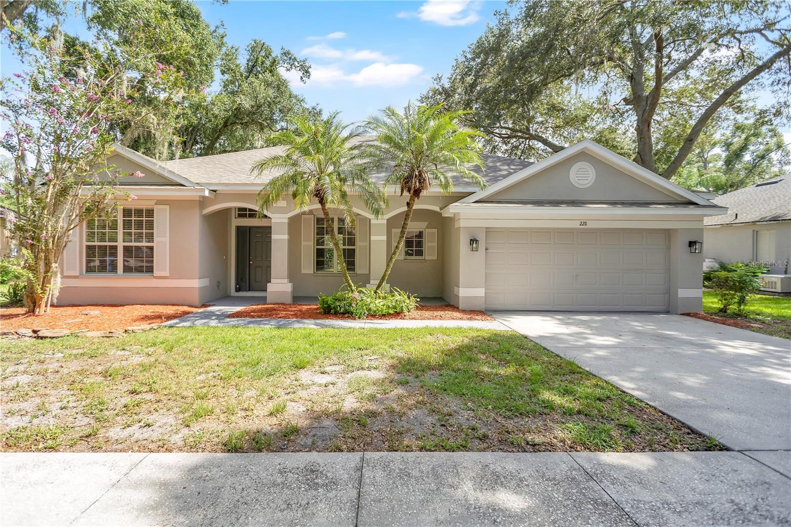 VR tour available. Seller offering up to $16,745 toward buyer closing costs, prepaid expenses, and/or an interest rate buydown when using Seller's preferred lender. Move-in ready 3-bedroom home with a dedicated office in Meadow Woods Reserve, an established tree-lined Valrico community with a low annual HOA and no CDD. The big-ticket items are done: new roof (2026), new HVAC (2026), new water heater (2026), fresh interior and exterior paint, and new carpet in the bedrooms. The renovated kitchen features new white shaker cabinets, new stone countertops with an undermount sink, a new microwave and dishwasher, a breakfast bar, and a functional layout overlooking the family room. A welcoming foyer opens to formal living and dining rooms, with laminate flooring through the main living areas. The spacious family room flows to a covered screened lanai and a fully fenced backyard with plenty of room for pets and play. The primary suite includes a walk-in closet and an en suite bath with a garden tub, separate shower, and dual-sink vanity, and both bathrooms have new faucets, fixtures, lighting, and toilets. New blinds throughout. Conveniently located near shopping, dining, and schools with an easy commute to SR 60 and I-75.