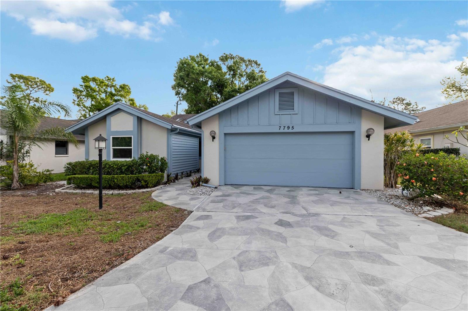 One or more photo(s) has been virtually staged. Welcome to effortless Florida living in the highly sought-after Pine Trace community of Palm Aire—where space, style, and value come together in one exceptional home. This beautifully maintained 3-bedroom, 2-bath residence offers over 2,000 square feet of thoughtfully designed living space, complete with a 2-car garage and a flexible floor plan perfect for today’s lifestyle. Multiple living areas provide the ideal setup for working from home, entertaining, or simply enjoying your own private retreat—without interruption. HVAC system (2018), water heater, hurricane-impact energy-efficient windows and sliders, and a new garage door opener. Inside, you’ll find hardwood laminate flooring, updated bathrooms, stainless steel appliances, fresh paint, and soaring vaulted ceilings that create a bright and inviting atmosphere throughout. The versatile den/reading room offers additional flexibility and can easily be converted back into a true third bedroom with the addition of French or barn doors—tailor the space to fit your needs. Located in a maintenance-free community, your monthly fee covers exterior maintenance, painting, pressure washing, roof repairs, and even future roof replacement—providing true lock-and-leave convenience with no surprise assessments. Plus, enjoy the benefits of NO CDD fees and a preferred Flood Zone X location. Positioned just minutes from University Town Center, Whole Foods, top dining, and shopping—and only a short drive to downtown Sarasota and the world-renowned beaches of Lido Key—this home delivers the ultimate blend of convenience and lifestyle. Offered at an exceptional price per square foot for a home of this quality, this is a rare opportunity that savvy buyers will recognize immediately. Ignore the days on market—this home’s story is simply waiting for its next chapter. Schedule your private showing today and discover one of Palm Aire’s best values.