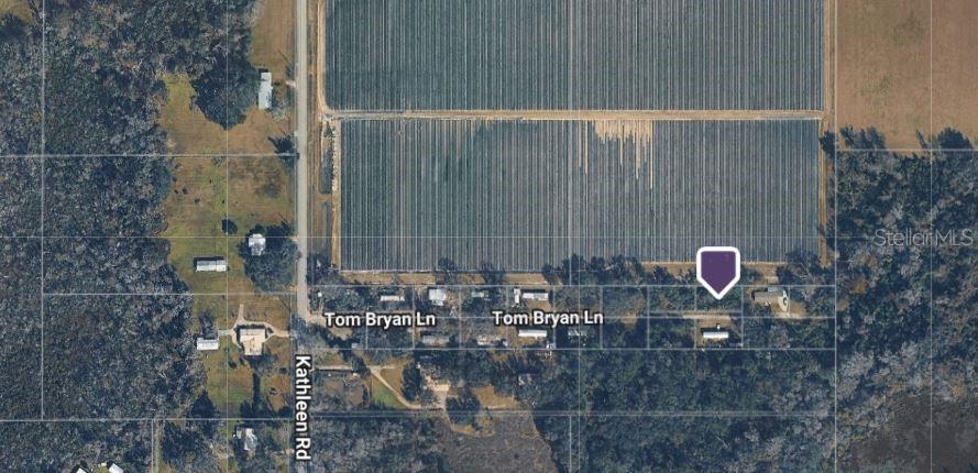 Vacant Residential lot in Kathleen, situated on a dead-end street. This lot is on a quiet street and backs up to strawberry farm for a peaceful and serene view. Check with Polk County planner on call for zoning questions, mostly manufactured homes on this street. No Flood zone and no HOA or deed restrictions. The lot is .17 acres and also is partially fenced.
