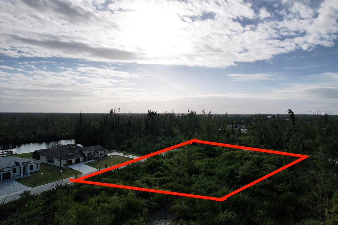 LOCATION!! LOCATION!!THIS BEAUTIFUL LOT IS AN OVER SIZE CORNER LOT. SIZE ALMOST 12 THOUSANDS SQUARE FEET, MORE THAN A QUARTER ACRES NEXT TO THE MOST EXPENSIVE HOUSES AND LOTS IN THE CITY. AND YOU WILL FACE MILLIONS $$$HOMES. THIS IS A WATERFRONT BOATING COMMUNITY IN SOUTH GULF COVE, WHICH HAVE A BOATING RAMP IN THE AREA. SOME OF THOSE HOMES AROUND YOU AND FACE YOU, HAVE DIRECT ACCESS TO TO THE GULF OF MEXICO. ALL UTILITIES ARE CLOSED BY, UTILITIES ON SITE ((WATER,SEWER,ELECTRICITY)).
AND READY TO BUILD YOUR NEW FLORIDA DREAM HOME. BEAUTIFUL MILLIONS DOLARS NEW HOMES ARE BUILDING RIGHT NOW, MOST ARE WATERFRONT ON THE SAME STREET. ALSO THEY ARE LARGE SIZE HOMES WHICH WILL BRING VALUE FOR THIS LAND IN THIS DEVELOPED AREA. LOT CLOSED TO CAPE HAZE. ONLY A FEW MILES NORTHEAST OF BEAUTIFUL BOCA GRANDE WHERE YOU CAN FIND ONE OF THE MOST EXPENSIVE ZIP CODE IN THE COUNTRY,...WORLD-CLASS TARPON FISHING, SHORT DRIVE TO THE BEACH AND TO THE GULF OF MEXICO. CLOSE TO SOME OF THE FINEST BEACHES. THIS SITE IS ALSO MILES AWAY FROM ONE OF THE NATION'S TOP GOLF CLUBS, CORAL CREEK CLUB. EASY ACCESS TO MAJOR AIRPORT. HOME OF TAMPA BAY RAYS SPRING TRAINING. NO SCRUB JAYS ON THIS SITE FROM CHARLOTTE COUNTY WEBSITE. THE OWNER WILL DELIVER A WARRANTY DEED BY FLORIDA STATUTE. THE OWNER IS ASKING TO CHOOSE FOR THE TILTE COMPANY AND WILL PAY FOR CLOSING COST . IF YOU NEED HELP FINDING A BUILDER, PLEASE REACH OUT TO US, WE CAN ASSIST YOU. BUILD TODAY OR BUY TOMORROW FOR INVESTMENT. VERY GOOD  OPPORTUNITY .