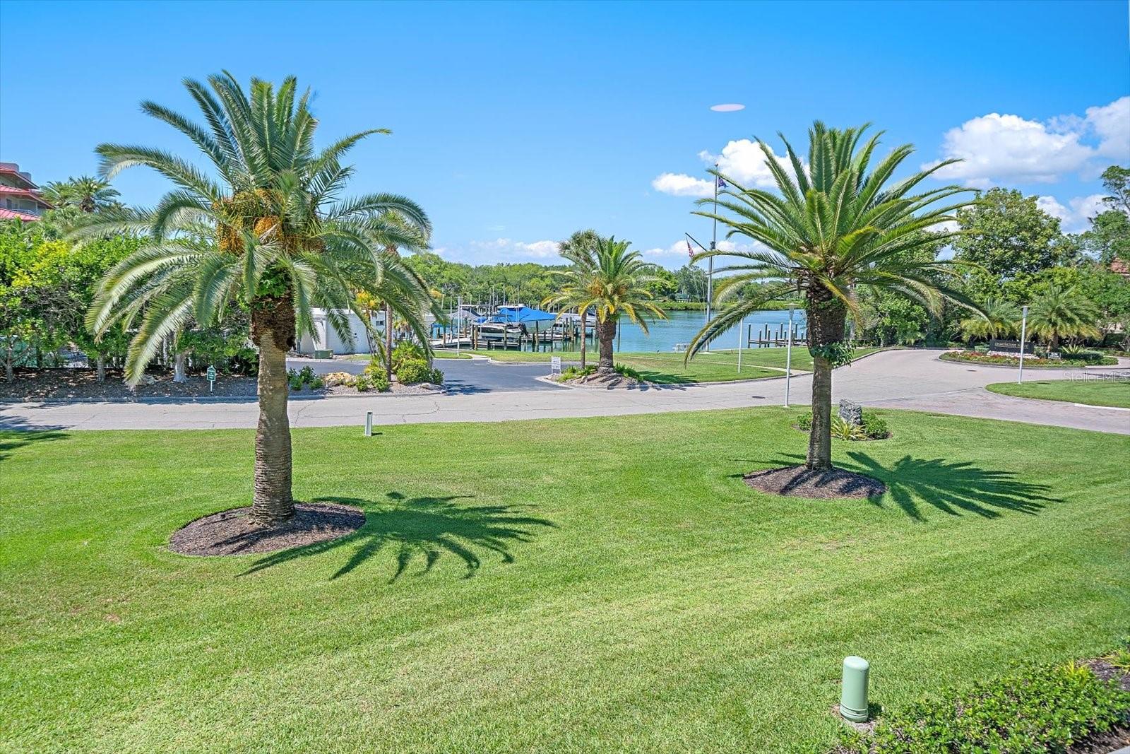 BACK ON THE MARKET with a New Price and Turn Key! Welcome to your slice of paradise, where coastal living reaches new heights of sophistication, and nestled inside the gates of the Longboat Key Club. This gorgeous 1492 sq. ft. water front residence underwent a total
transformation in 2023, and the results are nothing short of spectacular. Step inside this bright second floor residence and discover a two bedroom and two baths, with a view that feels serene, luxurious, and unmistakably coastal. This condo comes with a view of the private
marina tucked away in a quiet cove, where you can enjoy watching the dolphins at play.
Towering palm trees frame the scene beautifully, with the curved waterfront drive adds a resort-style elegance to this one-of-a-kind property. This kitchen has a bright, modern, upscale feel with a clean coastal-inspired design. White shake-style cabinetry with sleek brushed nickel handles, extending all the way to the ceiling for extra storage. Exotic granite counters, matched with a sleek white Carrara marble back splash. Stainless steel appliances, and a deep undermount sink with a tall industrial-style spring faucet. The expansive great room steals the show, with a dramatic wall of windows, open concept and LVP flooring thru out. Both bathrooms feature quartz counter tops, tiled floors and walk in showers. HVAC 2020.
Community amenities abound – enjoy the private beach with tiki’s, lounge chairs, pool, spa, library, community room with kitchen, marina access, bicycle storage, kayak launch, and additional owner’s storage space.
With in walking distance to well renowned St Armands Circle for shopping and dining experiences. The pristine white sandy beach and gentle turquoise waters are calling your name.
Schedule your private showing today and discover the lifestyle you deserve.