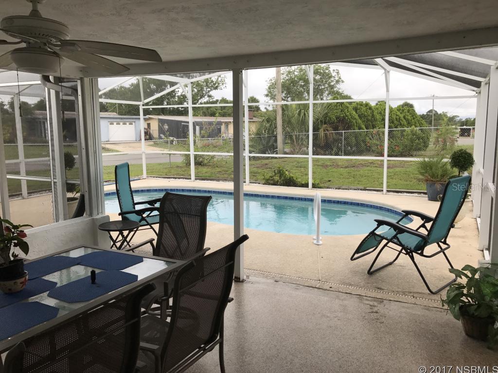 THIS LOVELY HEATED POOL HOME IS LOCATED ON A LARGE CORNER LOT AND IS WITHIN WALKING DISTANCE TO A MAJOR GROCERY STORE AND OTHER SHOPPING AND RESTAURANTS. THE SCREENED PATIO AND POOL ARE GREAT FOR ENTERTAINING OR JUST RELAXING BY THE POOL AND SIPPING ON THAT FAVORITE BEVERAGE. THERE IS ALSO A LARGE STORAGE SHED WITH A SLAB FOR KEEPING THE MOWER, YARD TOOLS AND TOYS. THE POOL WAS INSTALLED IN 2010, THE ROOF WAS REPLACED IN 2008 AND THE FURNACE AND A/C WAS REPLACED IN 2016. You do not want to miss this opportunity to own that pool home you have dreamed of. ;Water: City