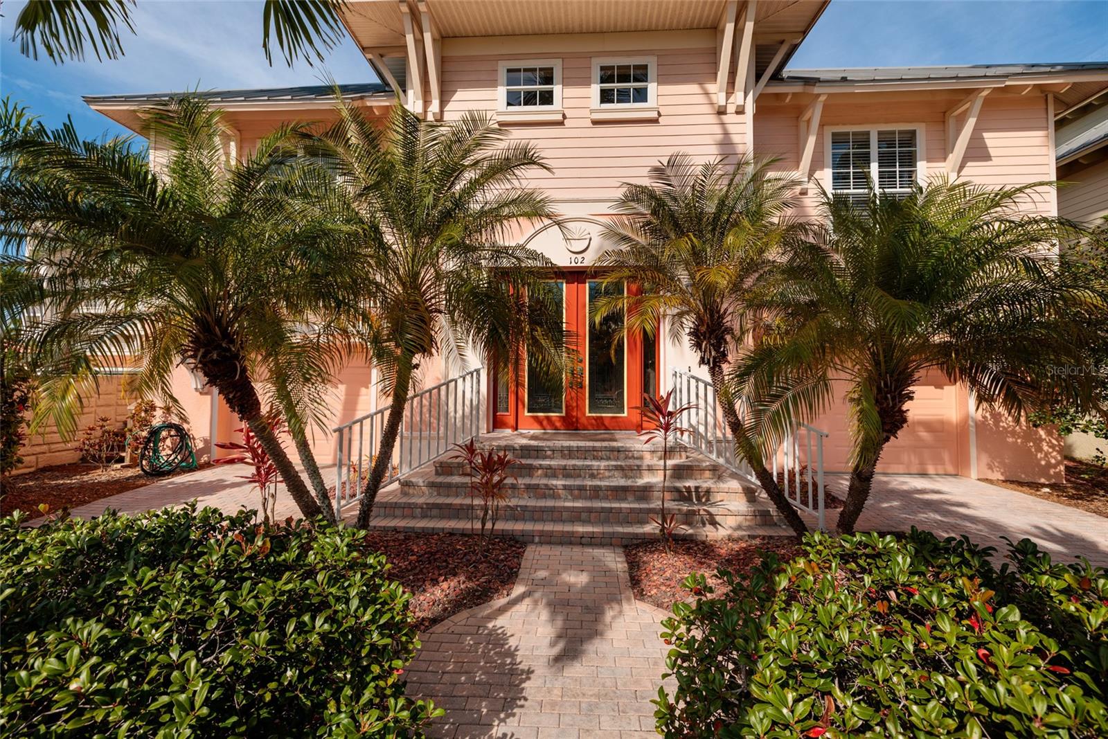*** REDUCED BY $50,000 *** Coastal living at its finest awaits in this exceptional, move-in-ready residence located just steps from the pristine sands of the Gulf in the prestigious, gated Redington Shores Yacht & Tennis Club. Solidly constructed in 2007 with concrete construction and high-quality modern finishes, this beautifully designed Key West–style home offers three bedrooms, two bathrooms, and a versatile bonus room or library that can easily serve as a fourth bedroom. A welcoming foyer leads to a generous 2500 plus square feet of recreational space, abundant storage, and an oversized four plus car tandem garage. The main living level features an open and flexible family room, dining room, and kitchen layout ideal for entertaining, highlighted by tile flooring, volume ceilings, and three private bedroom suites. French doors open to a covered balcony, creating the perfect indoor-outdoor flow for enjoying Florida’s coastal breezes. The kitchen is thoughtfully appointed with granite countertops, wood cabinetry, a center island, breakfast bar, and spacious pantry. The primary suite offers dual closets and a spa-like bath with a soaking tub and separate shower. An elevator shaft is already in place for future retrofitting if desired. Outdoor living is equally impressive with multiple balconies, covered patios, and a lush backyard. Ideally positioned at the end of a quiet cul-de-sac, this home sits right next to the clubhouse and community pool and directly across from Redington Beach with easy beach access. Residents enjoy resort-style amenities including a heated pool and spa, state-of-the-art fitness center, clubhouse with full kitchen and entertainment space, tennis and pickleball courts, kayak launch, and boat slip opportunities. Enjoy the rare combination of private single-family living, gated security, and true walk-to-the-beach convenience. Your perfect Florida coastal lifestyle starts here.