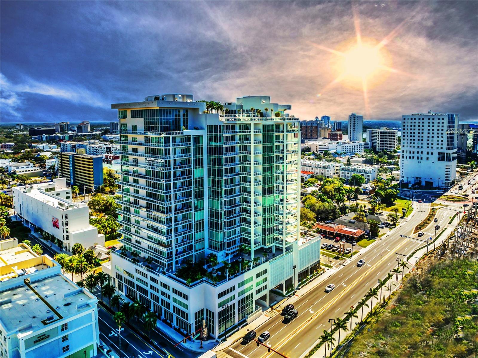 Motivated seller - bring offers to the table! In this 6th-floor unit, the owners and their award-winning designer, JKL Design, took a blank canvas that already offered exquisite features and amenities and elevated the design and installation of interior appointments to a whole new level. BLVD is occupied by only 49 owners, making the building intimate and manageable and the staff that’s in place to support the owner’s needs is in keeping with what you’d expect from luxury condominium living. As you enter Unit 602 from the private opening elevator, you can see just how expansive the unit is with its wide-plank French oak flooring, high ceiling and depth-of-field; as it pulls you from the glass-enclosed foyer into the rest of the nearly 4,000-square-foot residence. Upon entering the kitchen, you’ll find an 18-foot main island, that offers a tremendous amount of storage and ease of access, solid wood cabinets with dovetail joinery, Dacor appliances, a six-burner natural gas cooktop, glass tile backsplashes, a wine cooler and dry bar. There’s also a pantry and catering room that offers abundant cabinetry and spans 19 feet deep. From these rooms you can choose to spend enriched time with family or entertain friends in the stylish living room and dining room, which each feature floor-to-ceiling glass sliders and windows that go on and on, framing some of the nicest panoramic bay and Gulf water views in the area. The primary bedroom suite is lush with custom appointments that include imported marble countertops, crystal chandeliers and pendants, magnificent gold-finished mirrors and plumbing fixtures, imported porcelain tile floors and an endless wardrobe room that could match the needs of a fashion designer. There are also 2 private guest bedroom suites with en-suite bathrooms and walk-in wardrobe closets; one of which offers access to an outdoor terrace with seating, plus a half bath that features a one-of-a-kind antique armoire closet. And throughout, you’ll find automated Lutron lighting and motorized window shade controls. The building, which resides directly across from the new 53-acre downtown bay waterfront project that will feature a new performing arts center and elliptical-shaped bay walk, is rich with community amenities, such as a 19th-floor rooftop heated swimming pool (there is no 13th floor), 9,000 square feet of terrace space, seating areas, plus cabanas and a covered outdoor kitchen with grills and refrigeration for entertaining. On the 5th-floor amenities level, you’ll find a 1,400-square-foot outdoor pet lawn and pet spa, a professional fitness room, golf simulator room, club lounge with billiards, a wine room with assigned storage lockers, conference room and plenty of outdoor terrace seating. This beautifully appointed condominium comes with two secure parking spaces and is a very close drive to SRQ airport, area beaches and golf courses as well as a quick walk to the bayfront marina, opera house and live theatre venues, as well as great restaurants and service providers. Plan a visit to this wonderful condominium and see all that the building and this unit have to offer.