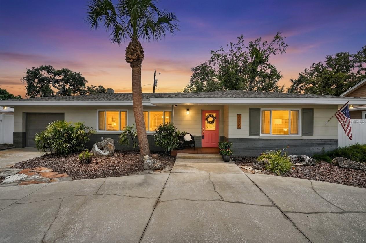 No hurricane damage or flooding!!  Gorgeous 2 bedroom, 2 bathroom Pool home in the very desirable Pasadena Golf Club Estates.  Unincorporated St Pete (allowing Airbnb) close to Gulfport Major Shopping areas, transportation, PYCC, schools, restaurants and much more this is the place you want to be!  You will love having LifeProof luxury vinyl plank through most of the home!  Big open living spaces with plenty of storage.  This living room is HUGE.  The living room/kitchen areas also have plenty of room for a dining and entertainment.  Check out this bonus room with built in desk area right leading to the pool and covered lanai, this would make a great family room or den.  You will love coming home to your own pool which has a new pool pump motor and salt water system (2026).  Enjoy this beautiful mature, landscaped back yard with lovely paver patio area which has been recently covered.  Updates include hurricane impact windows, vinyl fencing, pool finish, newer Roof,  attic insulation, salt system, new appliances including washer and dryer,  new AC, and hot water heater.  You will love this low maintenance home!  The whole interior has been repainted and had new soffits installed.  Plenty of parking with your garage and large circular drive.  Be sure not to miss out on this amazing home in a very desirable area with so many great improvements!  Current flood insurance is under $1000 per year.