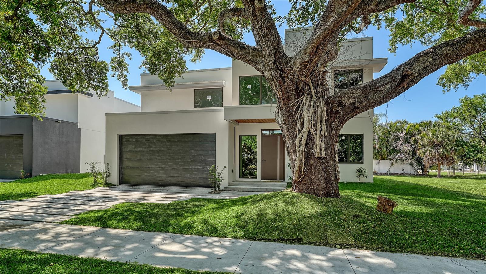 Less than 4 miles to Siesta Key Beach and under 3 miles to Downtown Sarasota, this newly built 4-bed modern home in Sarasota delivers luxury living, investment flexibility, and an exceptional West of the Trail location. Built in 2024, this contemporary residence offers approximately 2,900 square feet with 4 bedrooms+ den and 4.5 baths, featuring open-concept living spaces, clean modern design, energy-efficient construction, and seamless indoor-outdoor flow ideal for entertaining. Located within Sarasota city limits with 7-night minimum rental potential, this property is an outstanding opportunity for both investors and end users seeking a luxury lifestyle close to Downtown Sarasota, Southside Village, Sarasota Memorial Hospital, and Siesta Key Beach. Room for a future pool. Located within the coveted Southside school district. Seller financing available with a 5.5% interest-only loan for 2 years.
