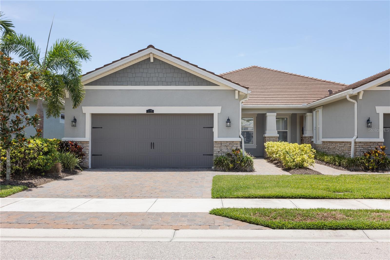 Virtually Staged. Welcome to an exceptional opportunity to enjoy maintenance-free living in a sought-after gated community offering resort-style amenities and a serene waterfront setting.

This well-appointed 2-bedroom, 2-bathroom villa also features a versatile office/den, perfect for working from home, a hobby room, or accommodating additional guests. Designed with comfort and functionality in mind, the open floor plan includes a spacious living room, a dedicated dining area, and a well-equipped kitchen with plenty of cabinet and counter space, making everyday living and entertaining effortless.

The split-bedroom layout provides privacy for both homeowners and guests, while the spacious primary suite offers a relaxing retreat with an en-suite bathroom. A second full bathroom serves the guest bedroom and office area.

Step outside to the screened lanai, where you'll enjoy peaceful mornings and tranquil evenings overlooking a beautiful pond. The picturesque water view creates a private and relaxing backdrop, making the lanai the perfect place to unwind with a cup of coffee or entertain friends and family.

Residents enjoy an active, resort-inspired lifestyle with outstanding HOA amenities, including a clubhouse, fitness center, resort-style pool, spa, and tennis courts. The gated entrance provides added privacy and peace of mind, while the prime Sarasota location places you just minutes from world-class beaches, championship golf courses, shopping, dining, medical facilities, and the area's vibrant arts and cultural attractions.

Whether you're looking for a full-time residence, seasonal getaway, or investment property, this charming home offers the perfect blend of comfort, convenience, and Florida living. Don't miss the opportunity to make this beautiful water view home your own.