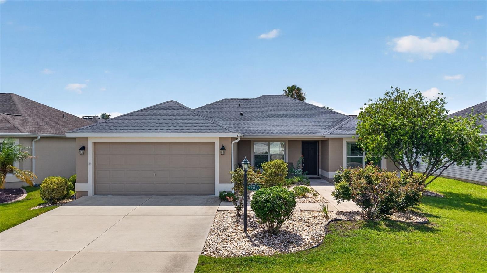 The Villages LOCATION ALERT !! This beautiful TURNKEY Allamanda model home is nestled in the highly desirable Village of Hillsborough. Offering 3 bedrooms, 2 bathrooms, a 2-car garage, and 1,559 sq. ft. of air-conditioned living space, this beautiful residence perfectly captures The Villages lifestyle. NEW ROOF 2026 NEW HVAC 2023
Step inside to discover an open, inviting floor plan beautifully enhanced by luxury vinyl plank flooring. The well-appointed kitchen features elegant cabinetry, quality countertops, white appliances, and a convenient breakfast bar — ideal for casual dining and entertaining.
The spacious primary suite boasts dual walk-in closets and a luxurious ensuite bath with dual vanities and a stunning tiled shower. The thoughtful split-bedroom design ensures privacy for guests, while the guest bathroom offers a tiled tub/shower combination.
Additional highlights include a 120 sq. ft. glass-enclosed Florida room — perfect for year-round entertaining — and an 135 sq. ft. expansive screened lanai.
Located on a quiet street, this home is just 2 miles from Brownwood (less than a 10-minute golf cart ride) and within walking distance to the Manatee Recreation Center, which offers an adult pool, bocce, horseshoes, shuffleboard, and more. Enjoy effortless golf cart access to shopping, dining, medical facilities, and world-class entertainment at Brownwood, Lake Sumter Landing, and other Villages squares.
Whether you're looking for a full-time residence, a seasonal retreat, or an excellent investment property, this move-in-ready home has it all. Schedule your private showing today and experience The Villages lifestyle at its finest!
