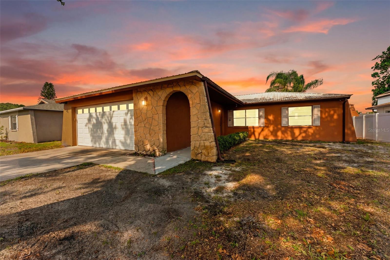 Welcome to 611 Tangerine Drive a well-maintained 3-bedroom, 2-bathroom home located in one of Oldsmar’s most desirable and centrally located communities. Featuring a highly sought-after split floor plan, spacious living areas, and major system upgrades already completed, this home offers the perfect combination of comfort, functionality, and opportunity for a new owner to make the space their own over time.

Inside, you’ll find tile flooring throughout the entire main living space, creating a clean, cohesive, and low-maintenance living environment. The split layout provides excellent separation between the primary suite and guest bedrooms, offering both privacy and flexibility for families, guests, or work-from-home living. The spacious primary suite features dual closets along with a beautifully updated master bathroom that adds a more modern touch to the home. The kitchen is equipped with stainless steel appliances and offers excellent functionality with ample cabinet and storage space, while still leaving room for future personalization and design possibilities to match your own style and vision.

Several major improvements have already been completed for long-term peace of mind, including full-home repiping, a whole-house water softener and filtration system, and a durable Solar Shield metal roof designed for longevity, efficiency, and reduced maintenance for many years to come. The home has also never FLOODED! This provides additional confidence for future ownership. Outside, the screened-in porch creates the perfect place to relax and enjoy Florida’s year-round weather, while the newer fencing surrounds the backyard and offers both privacy and space for entertaining, pets, or outdoor enjoyment. A spacious two-car garage and abundant storage throughout the home further enhance everyday convenience.

Located in the heart of Oldsmar, this property offers outstanding access to everything that makes the Tampa Bay area so desirable. Tampa International Airport, Clearwater Beach, Safety Harbor, Dunedin, and downtown Tampa are all within a convenient drive. Oldsmar is known for its excellent school district, strong community atmosphere, waterfront parks, scenic trails, playgrounds, nature preserves, and outdoor recreation. With its ideal location, major mechanical upgrades, flexible layout, and endless potential to further enhance and customize over time, 611 Tangerine Drive presents an exceptional opportunity in one of northern Pinellas County’s most sought-after communities.