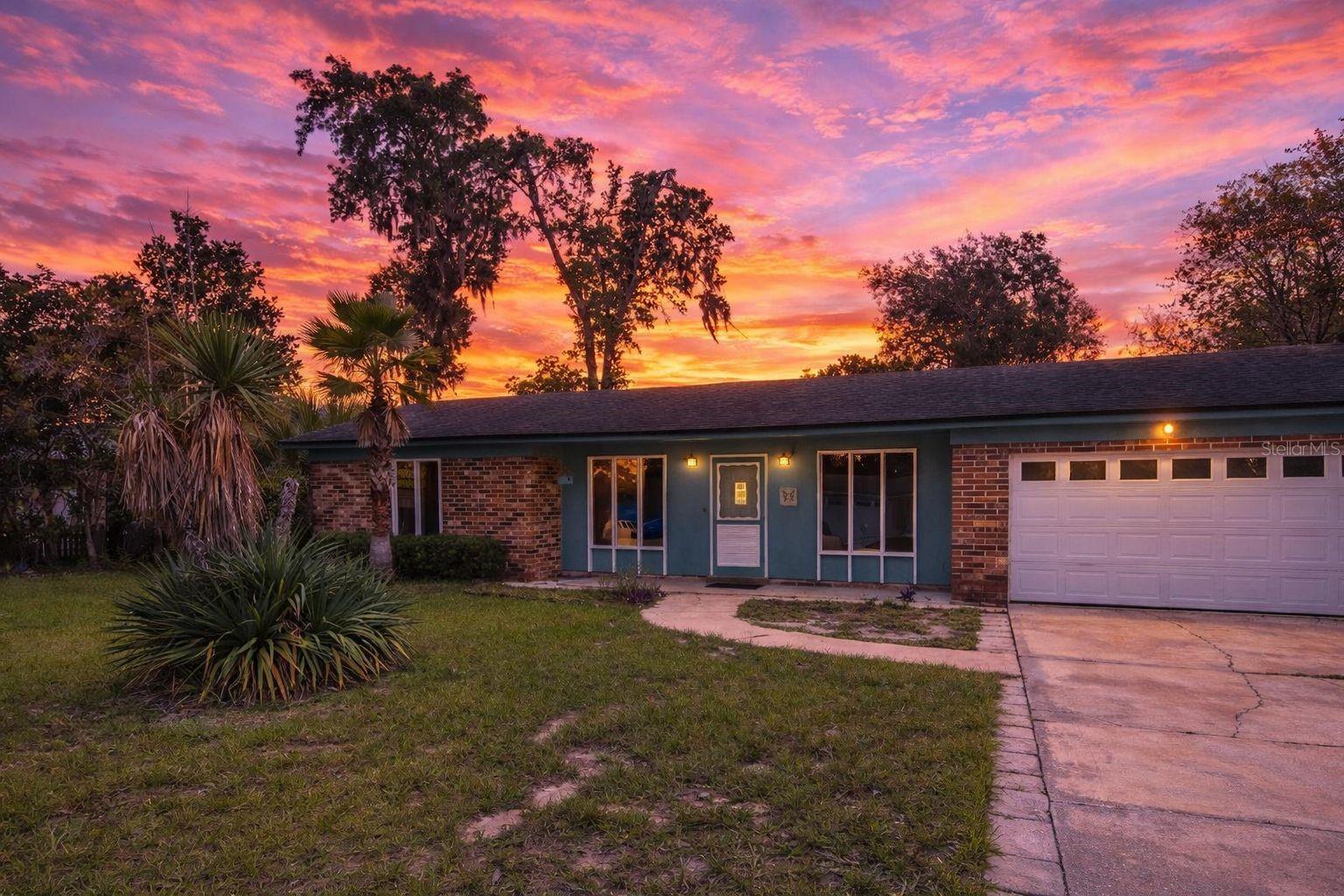 Live in the City - Enjoy the River! This move-in ready 3/2 home with an in-ground pool, is in an established Orange Park neighborhood close to everything you need! Minutes from schools, restaurants, and beautiful Doctor's Lake. Only 15 minutes from the Lakeshore Boat Ramp and Whitey's Fish Camp, and just 4 miles from the Thrasher-Horne Center. Conveniently situated between local hospitals, this home offers both comfort and convenience. Inside, you'll find new flooring, kitchen cabinets, countertops, and sliding glass doors that open to a spacious 280 sq. ft. screened porch overlooking the 16'x30' in-ground pool—perfect for relaxing or entertaining. The large living room is big enough to create both a living and sitting area and features a cozy fireplace. The primary suite includes an ensuite bath and two closets, while the second and third bedrooms share a full bath and has generous closet space. The home is vacant and waiting for your personal touches to make it your own.