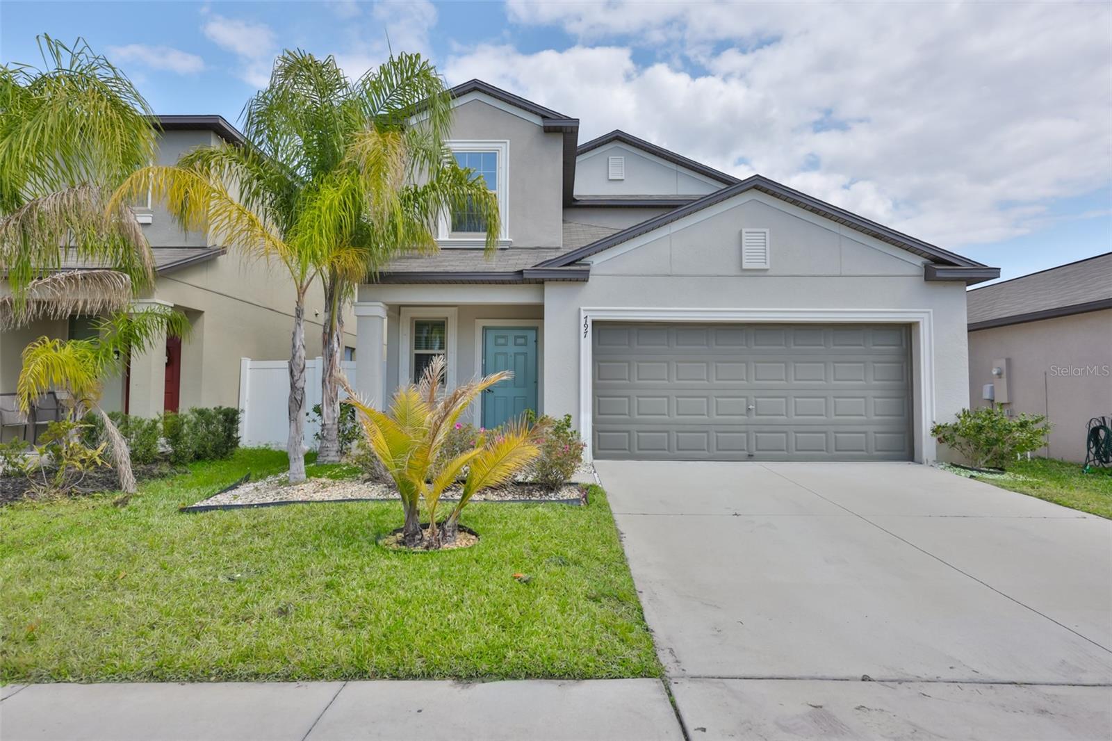 One or more photo(s) has been virtually staged. Welcome Home to 797 Olive Conch Street, nestled in the highly desirable community of Shell Cove in Ruskin! This home boasts 5 bedrooms, 2-1/2 bathrooms and a spacious open floorplan that features a living room, eat-In Kitchen with oversized island and a dining room, offering the perfect blend of comfort, functionality, and location. The kitchen features ample countertop space, appliances, abundant cabinetry, and a walk-in pantry, making it perfect for everyday living and entertaining alike. The primary suite is conveniently located on the 1st floor, offering privacy and ease of access of oversized walk-in closet and spacious layout. Upstairs, you will find a spacious family room loft and 4 additional bedrooms provide flexibility for family, guests, or workspace needs.