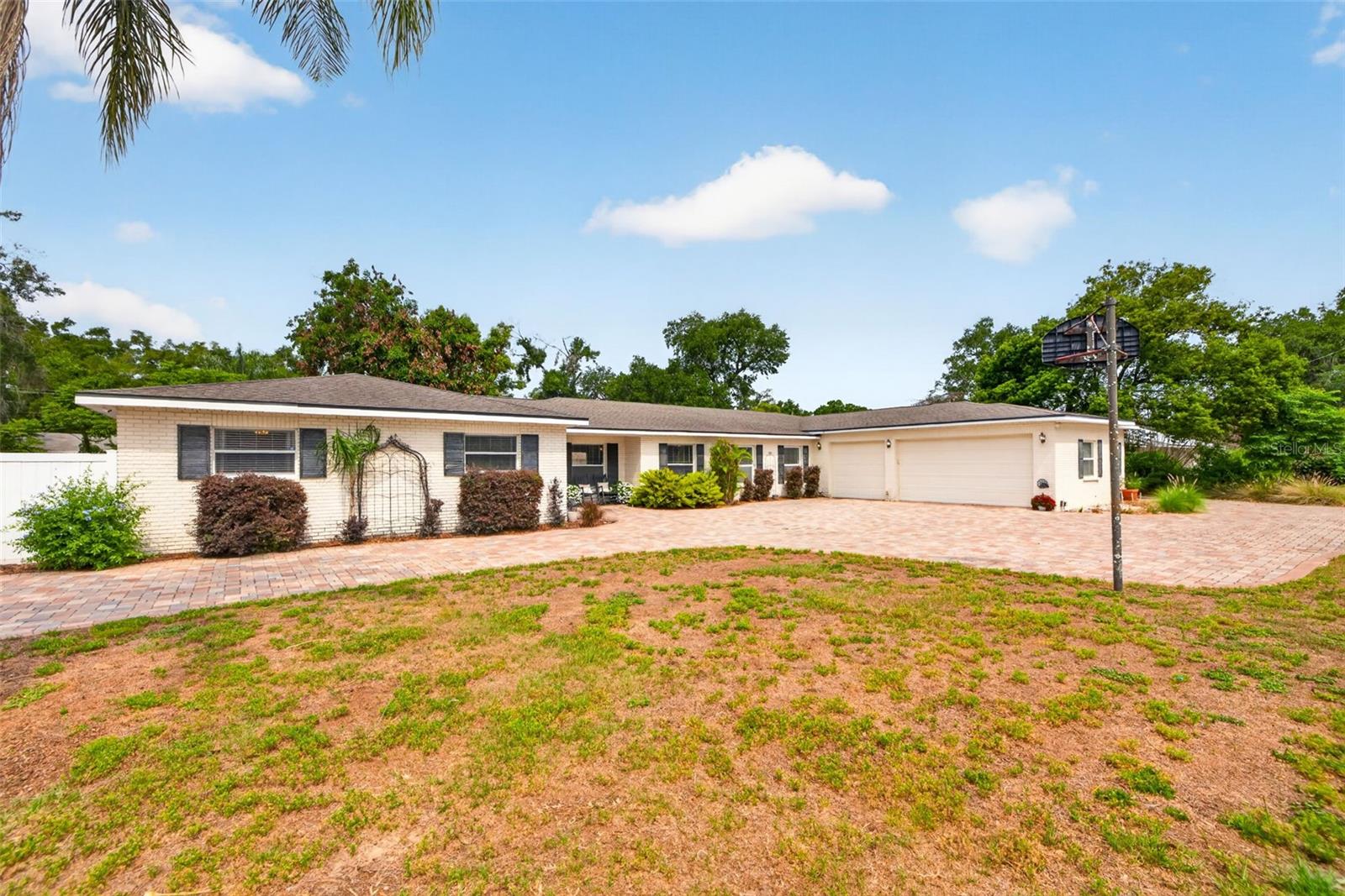 NEW PRICE with the same pace, personality, and endless possibilities in this exceptional Brandon property situated on a massive 26,250 square foot lot with no HOA. Offering all one floor living with a thoughtful split bedroom design, this 4 bedroom, 3.5 bath home provides the flexibility today’s buyers crave whether accommodating multi generational living, entertaining on a grand scale, or simply enjoying room to spread out. At the center of the home is a huge chef’s kitchen featuring a stunning oversized granite island, double ovens, wet bar, and direct connection to the oversized family and game room creating the perfect gathering space for holidays, celebrations, and everyday life. Outside, the expansive pavered driveway and oversized 3 car garage provide incredible space for boats, trailers, RVs, and more. Meticulously maintained throughout, the home’s most unforgettable feature is the spectacular custom Irish bar and pub, a truly irreplaceable space that delivers instant wow factor and creates an atmosphere unlike anything you have ever seen. Perfectly positioned in a convenient central Brandon location, this property offers a rare opportunity to own a home with both heart and functionality.