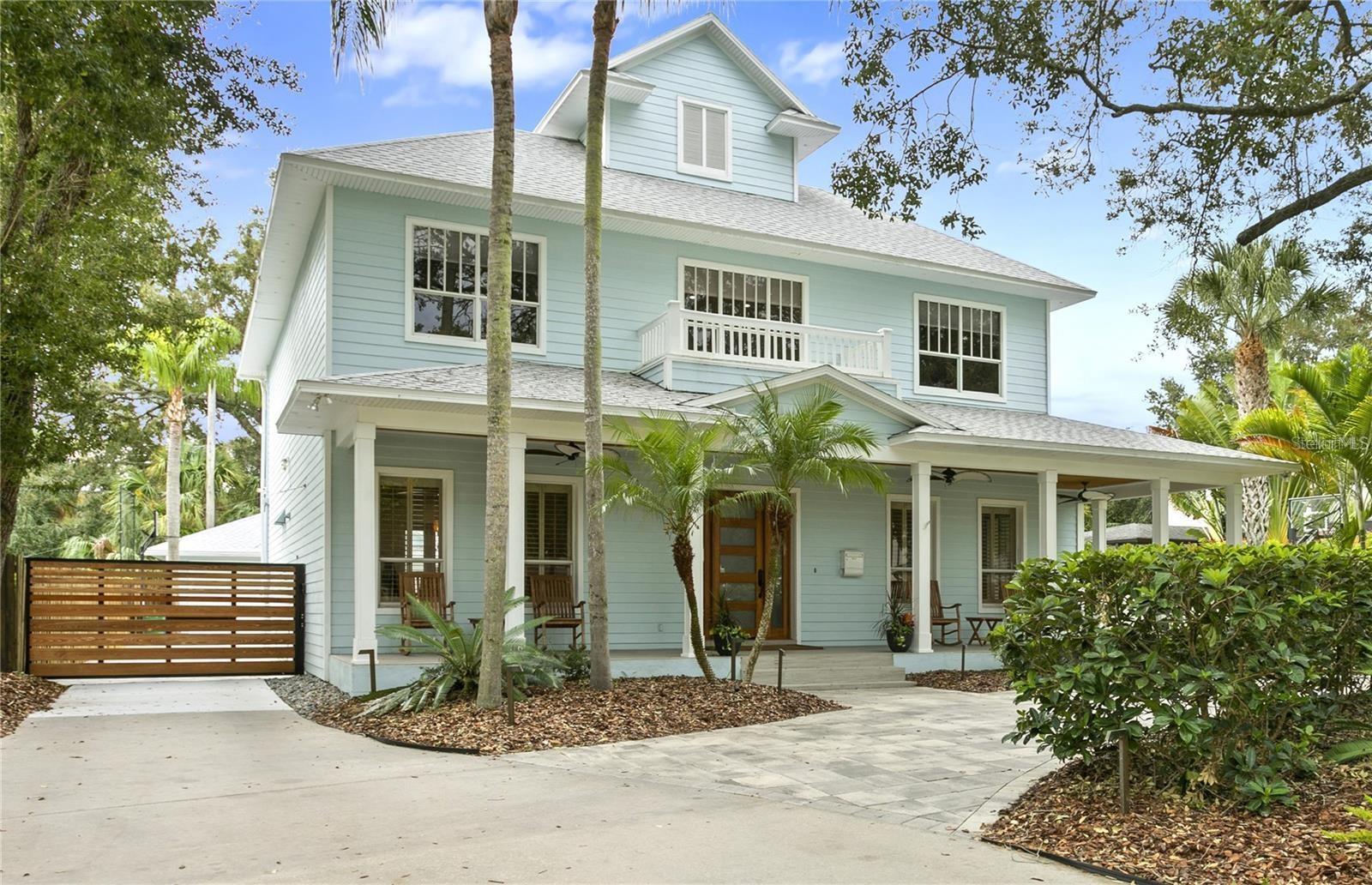 Located in South Tampa's popular Beach Park, this stunning 5024sf, 5 bedroom, 6.5 bath Key West style pool home has been renewed inside and out, offering a spacious floor plan with primary suites on both 1st and 2nd floors. Cook like a gourmet chef in the open concept kitchen with custom cabinetry, striking marble countertops and top-line appliances. The private back yard is an entertainment paradise with covered porch, spacious patios, outdoor smoker & grill, party sized swimming pool and a cabana with full bath. Additional amenities include new roof, renewed luxury baths, Wood flooring throughout, large second floor game room and Gated drive. Room Feature: Linen Closet In Bath (Primary Bathroom).