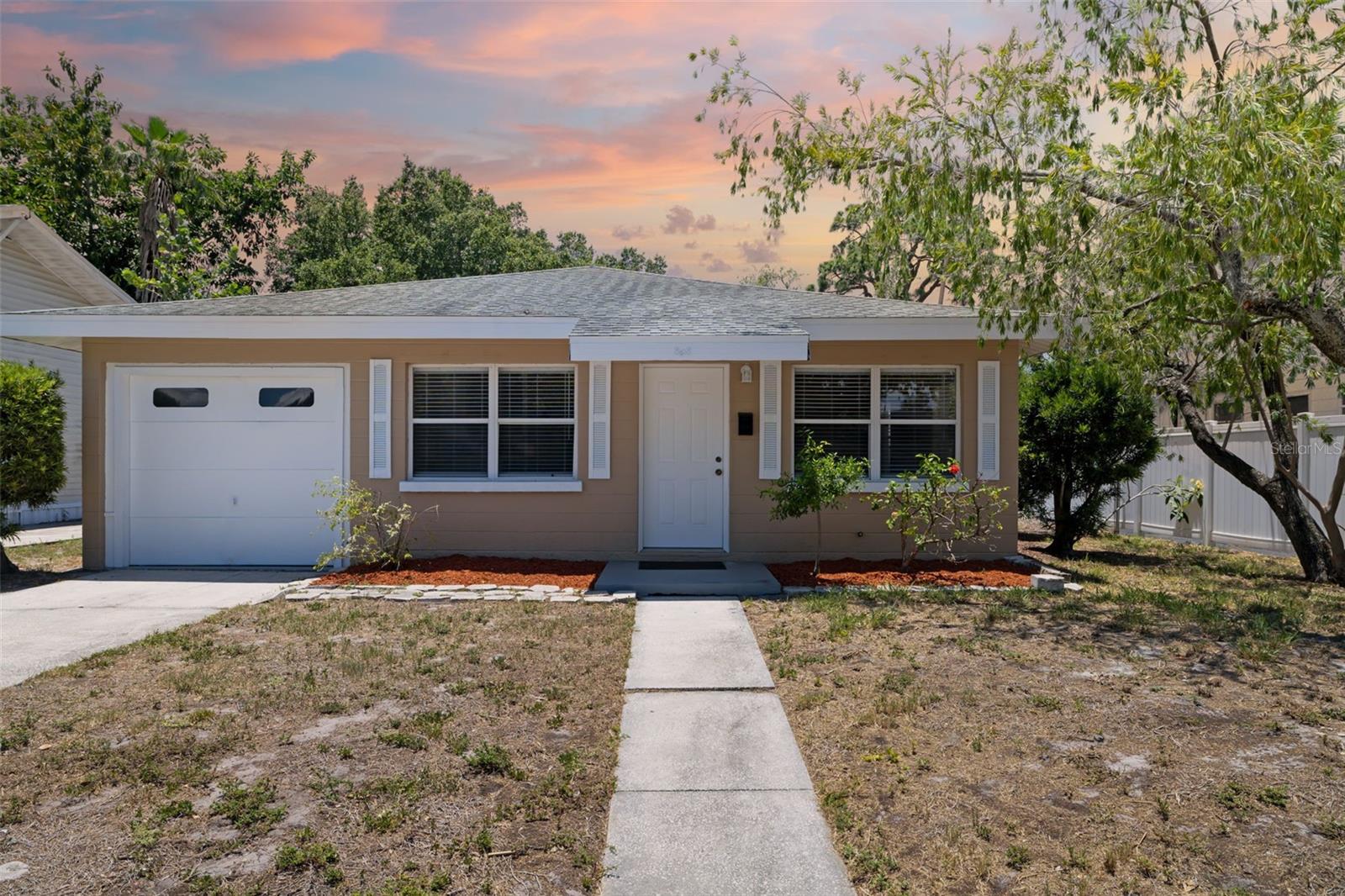 Move right into this beautifully remodeled and professionally cleaned two-
bedroom concrete block home, where functional living spaces and thoughtful
improvements create a warm and inviting place to call home. Freshly painted
inside and out, the spacious living area features updated light fixtures, new luxury
vinyl plank flooring throughout, new carpeting in the bedrooms, new window
treatments, and new ceiling fans that enhance both comfort and style. The
home's architecture offers abundant shelving and storage space, providing plenty
of room for your treasured belongings. The kitchen combines functionality and
storage with updated cabinetry, updated new hardware, a wall oven with
convection capabilities, a new refrigerator, and an oversized walk-in pantry that
provides exceptional storage space. In addition to two private bedrooms with
generous closets, the home includes a versatile flex room that can easily serve
as a home office, den, media room, hobby space, or potential third bedroom. The
remodeled bathroom features updated finishes and a new vanity, while additional
improvements throughout the home include updated windows, new front and rear
steel entry doors, upgraded electrical components/switches/outlets and covers.
Major systems offer peace of mind with a roof replaced in 2013, an HVAC
system installed in 2017 and recently serviced, and updated plumbing
components. The attached one-car garage offers additional storage with pull-
down attic access and laundry hookups for added convenience. Outside, enjoy a
fenced backyard with rear alley access and a gated entry, providing ample room
for additional parking, recreational vehicles, boats, trailers, or guests. The
oversized lot offers both flexibility and privacy while allowing convenient access
from the front and rear. A unique advantage of this property is its commercial
zoning, creating opportunities for both residential and business use. Whether for
a small professional office, accounting practice, law office, salon, studio, or other
permitted uses, this versatile property presents an exceptional opportunity for
owner-occupants, investors, and entrepreneurs alike. Property is in Flood Zone
X. Conveniently located near shopping, dining, parks, schools, and everything
the Bradenton area has to offer, this move-in-ready home is ready for its next
owner. Schedule your private showing today!