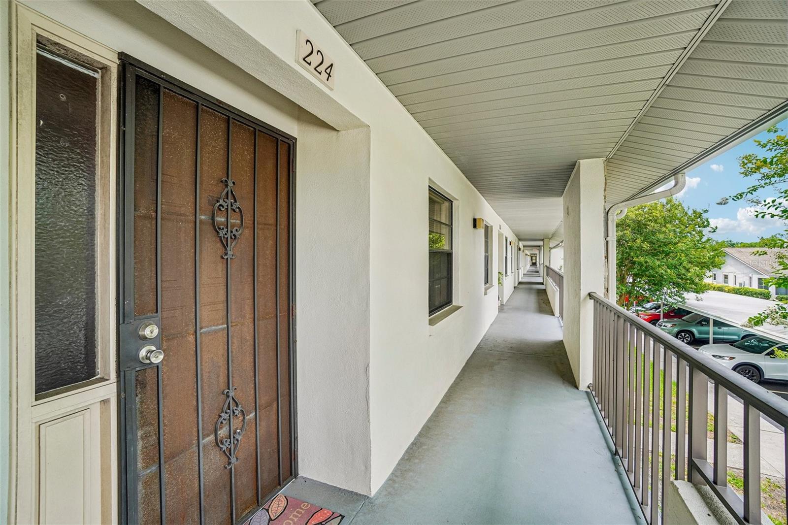 NON-FLOOD ZONE! INVESTORS WELCOME! Introducing you to Harshaw Lakes, one of St. Petersburg’s desirable 55+ communities, where comfort, convenience, and low-maintenance living come together. This spacious 2-bedroom, 2-bath condominium offers approximately 1,200 square feet of thoughtfully designed living space in a prime central location with easy access to downtown St. Petersburg, Gulf beaches, shopping, dining, and I-275. The inviting floor plan features a bright and open living and dining area, complemented by a generously sized kitchen complete with a breakfast nook and pantry. Enjoy your morning coffee or unwind in the evening from the private screened balcony overlooking a peaceful neighboring property, providing a tranquil and secluded backdrop. The balcony also includes a convenient storage room and an in-unit washer and dryer for added functionality. The primary suite serves as a comfortable retreat, featuring private balcony access, two closets—including a spacious walk-in closet—and an ensuite bath with a dedicated makeup vanity, walk-in shower, and safety grab bars. A well-appointed guest bedroom and nearby full bath provide privacy and convenience for visitors.
Located on the second floor with elevator access, this residence is in a non-evacuation zone and includes one covered carport parking space. Residents of Harshaw Lakes enjoy beautifully maintained grounds, a community pool, and an active clubhouse with social events and activities. Whether you're looking for a seasonal retreat or a year-round residence, this home presents an exceptional opportunity to enjoy the Florida lifestyle. Schedule your private showing today!
