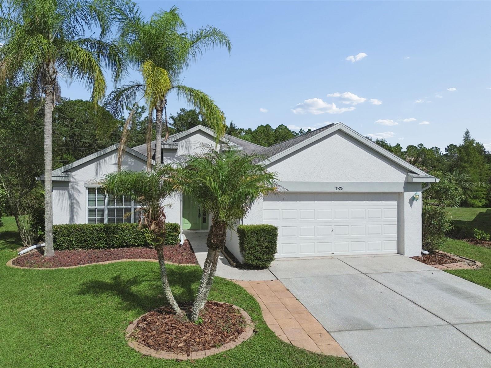 Welcome to your own private Florida retreat in the highly sought-after Plantation Palms Golf
Community! Nestled on a quiet cul-de-sac with serene conservation views, this beautifully maintained
3-bedroom, 2-bath pool home offers the perfect combination of privacy, comfort, and everyday
convenience.
Step inside to a bright, open floor plan featuring spacious living and dining areas designed for both
relaxed living and effortless entertaining. Large windows fill the home with natural light while
showcasing peaceful backyard views. The well-appointed kitchen overlooks the main living spaces,
making it easy to stay connected with family and guests.
The spacious primary suite provides a private escape with an en-suite bath and generous closet
space, while two additional bedrooms offer flexibility for family, guests, or a home office.
Step outside and experience the Florida lifestyle you've been dreaming of. The screened-in lanai
features a sparkling in-ground pool and relaxing spa overlooking tranquil conservation, creating the
perfect setting for morning coffee, weekend barbecues, or unwinding after a long day. With no rear
neighbors, you'll enjoy exceptional privacy and beautiful natural surroundings year-round.
Located in the desirable Plantation Palms community, residents enjoy access to a championship golf
course, scenic walking paths, and beautifully maintained surroundings. Conveniently located near
top-rated schools, shopping, restaurants, Tampa Premium Outlets, Wiregrass Mall, AdventHealth,
BayCare Hospital, and major highways including SR 54, US-41, and I-75, commuting throughout the
Tampa Bay area is simple and convenient.
Whether you're looking for a primary residence, seasonal getaway, or a home designed for
entertaining, this property offers an exceptional opportunity to enjoy the best of Land O Lakes living.
Schedule your private showing today!