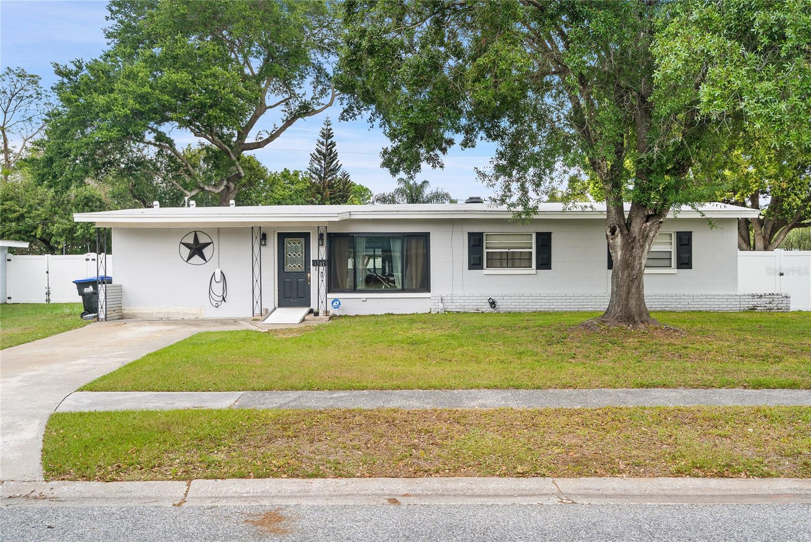 Seller offering $5000 in closing costs or rate buy down! Experience the perfect combination of space, comfort, and location in this expansive single-story ranch home, ideally situated in the highly sought-after Kingswood Manor neighborhood near Lee Road in Orlando. This beautifully maintained 5-bedroom, 3-bathroom residence offers a spacious and flexible layout designed for modern living and entertaining. Step inside to a bright living and dining room with vaulted ceilings, flowing seamlessly into a large family room featuring a wet bar and direct views of the private backyard oasis. The oversized primary suite provides a true retreat, complete with an ensuite bath and walk-in closet. A dedicated fifth bedroom with its own private entrance and full bath offers incredible flexibility—perfect for in-laws, guests, a teen suite, home office, or even rental income. Three additional bedrooms and a third full bath round out the well-appointed floor plan, ideal for growing families or those needing extra space. Step outside through brand-new Anderson Renewal sliding glass doors to enjoy a resort-style backyard, complete with a private in-ground pool, gazebo, and metal shed—all set on an oversized lot with new vinyl fencing and French drains. Whether you're hosting friends or relaxing solo, the outdoor space is a true extension of your living area. Conveniently located just minutes from Winter Park, College Park, and downtown Orlando, this home offers easy access to shopping, dining, and major highways—combining neighborhood charm with unbeatable connectivity. Notable updates include: Complete Plumbing Re-Drain (2026) New electric meter box (2026) Guest Bathroom remodel (2026) New Rheem 4-ton 17 SEER A/C (2025) New vinyl fencing (2025) New Anderson Renewal sliding doors & front window (2025) All-new kitchen appliances (2025) Paid-off outdoor security camera system Tesla charger (2025) Pool Fence (removable) (2025) New Pool Timer & Filer (2025) Roof (2024) Whether you're looking for a spacious family home, multi-generational living, or income potential, this home offers it all—with style, comfort, and updates that matter. Don’t miss this rare opportunity—schedule your private tour today and discover the lifestyle that awaits!