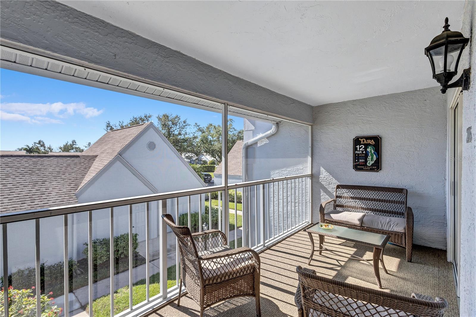 Live the Florida Country Club Lifestyle for Less!
Welcome to 6713 Stone River Rd 205, a meticulously maintained 2-bed, 2-bath, 1-car garage condo in The Verandas at Tara. This is your chance to own a piece of paradise with an unparalleled value proposition: a deeded golf membership to Tara Golf & Country Club, saving you thousands annually on championship golf and exclusive amenities!
Step inside this spacious and quiet 2nd-floor unit, offered partially furnished for your convenience. Enjoy breathtaking, million-dollar views of the fairway tees from your eat-in kitchen or the expansive, glass/screen-enclosed lanai. This versatile space can seamlessly expand your living area or become your private sunroom, offering serene treed golf course vistas. Vaulted ceilings and a spacious kitchen with solid wood cabinets create an open feel. An additional screen-enclosed front lanai provides another peaceful spot to savor the morning sun.
Beyond your doorstep, discover resort-style living. You're just steps away from the large heated community pool! The Tara Golf & Country Club boasts an 18-hole championship golf course (recently renovated with $1.5M!), a state-of-the-art exercise facility, hot tub, sauna, heated lap pool with a concession stand, Har-Tru tennis courts, bocce ball, and pickleball coming in 2025! The magnificent Tara Clubhouse offers fine dining, a grill room, a driving range, a putting green, a pro shop, and a very active social calendar featuring regular entertainment.
Recent updates include AC (2019), Water Heater (2019), and Roof (2018). The Total Area is 1,385 SqFt. Tara Reserves and The Verandas at Tara are financially sound associations.

Enjoy million-dollar picturesque views from your screened and glass-enclosed lanai (the first-floor units don't give you this view) and maintenance-free living in a secure, beautifully manicured community. With low HOA fees and no state income tax, this is the smart play for snowbirds & sunbirds, investors, or year-round golfers.

Priced below market and ready to move in — see it today before the snowbirds and sunbirds return.

Highlights:
 • DEEDED GOLF MEMBERSHIP is a True Value!
 • Washer/dryer in unit!
 • Heated community pool, Har-Tru Tennis, Pickleball, Gourmet Clubhouse Dining, Bocce, Driving Range, Putting Green, Activities and Entertainment Daily, and much more.
 • Just 20 minutes to beaches and SRQ Airport
 • No CDD fees!

Motivated seller – bring your best!   Golf where you live. Live where you golf!  ... and you're one of the closest condos to the large heated community pool!

AC 2019.  Water Heater 2019.  Roof 2018.  Tara Reserves are financially sound.

This condo is the best value in the Bradenton/Sarasota area. HOA provides water, sewer, and internet/Cable.  

You can buy a home anywhere, but you can't buy a lifestyle. Come to Tara and live the Florida Country Club lifestyle at its best.
