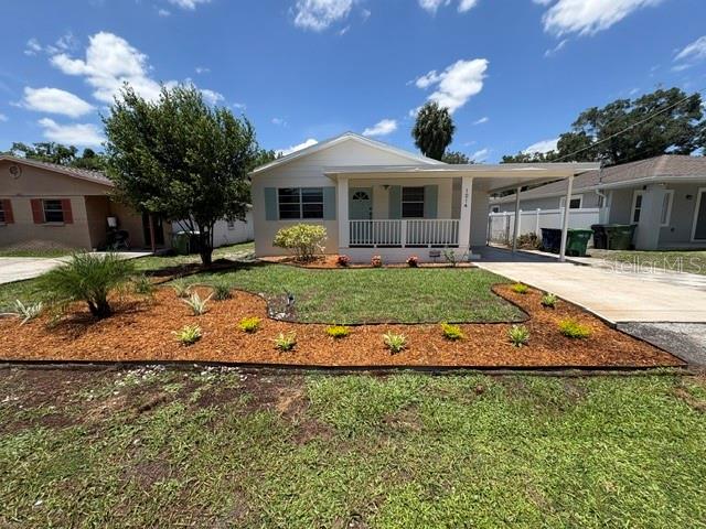 Move-In Ready Tampa Gem with Modern Upgrades and Timeless Charm

Step inside this beautifully updated Tampa home and immediately appreciate the warmth and character of the stunning original hardwood floors that flow throughout, adding timeless elegance to every room.

Designed with both comfort and entertaining in mind, the bright, open floor plan creates an inviting atmosphere for family and guests alike. The fully remodeled kitchen is a standout feature, showcasing brand-new soft-close cabinetry, sleek stainless steel appliances, luxurious granite countertops, and a striking mosaic marble backsplash that perfectly blends style and functionality.

The bathroom has been completely renovated, while fresh interior and exterior paint provide a crisp, modern feel throughout the home. Additional updates include new window blinds, custom closet organizers, a brand-new A/C condenser, and a new roof with updated soffits—offering peace of mind for years to come.

Enjoy the convenience of an on-site laundry area, relax on the spacious covered front porch, or entertain in the large, fully fenced backyard with plenty of room for pets, play, and outdoor gatherings.

Ideally located in the heart of Tampa, this home is less than four miles from the Bruce B. Downs VA Hospital, and the USF campus. Enjoy easy access to a nearby golf course, Busch Gardens, downtown Tampa, and historic Ybor City. As an added bonus, a community recreation center is located directly across the street, providing convenient access to fitness, sports, and recreational activities.

This thoughtfully updated home combines classic character, modern upgrades, and an unbeatable location—making it a must-see opportunity.