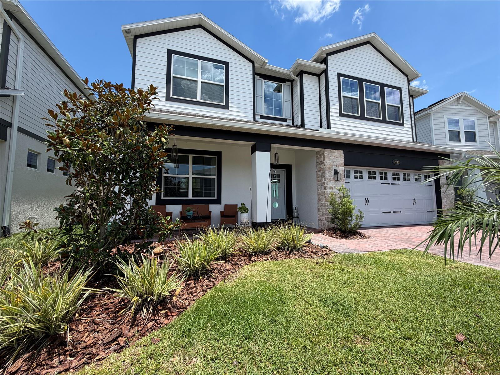 Welcome to this exceptional MI Homes residence, built in 2024, offering luxury, space, and breathtaking water views in the growing master-planned community of Crossprairie. With convenient access to the Florida Turnpike, commuting to Orlando, Lake Nona, and surrounding areas is effortless while enjoying the charm of Saint Cloud.
Designed for both everyday living and entertaining, this spacious home features 5 bedrooms, 4 FULL bathrooms, an additional downstairs BONUS room, an oversized upstairs LOFT complete with a WET BAR, and a tandem 3 (THREE)-CAR GARAGE.
The gourmet kitchen is the heart of the home, showcasing elegant quartz countertops, a designer tile backsplash, double built-in ovens, abundant cabinetry, and a large center island perfect for gathering with family and friends. Beautiful tile and luxury vinyl plank flooring flow throughout the home—there is NO carpet.
A private first-floor guest bedroom with a full bath provides the ideal space for guests or multigenerational living. Upstairs, the luxurious primary suite serves as a private retreat, complete with a spacious sitting area and a private balcony overlooking two tranquil ponds, creating the perfect setting for morning coffee or evening sunsets.
The expansive loft with its own wet bar offers endless possibilities as a media room, game room, or entertainment space. Step outside to the fully fenced backyard where the covered lanai has already been prepped for a future outdoor kitchen, making it easy to create the outdoor living space you've always envisioned while enjoying peaceful water views.
Offering premium finishes, flexible living spaces, and picturesque pond views, this like-new home perfectly combines elegance, comfort, and functionality. Located in the sought-after Crossprairie community with easy Florida Turnpike access and close proximity to shopping, dining, schools, and everyday conveniences, this is an incredible opportunity to own a beautifully upgraded home without waiting for new construction.