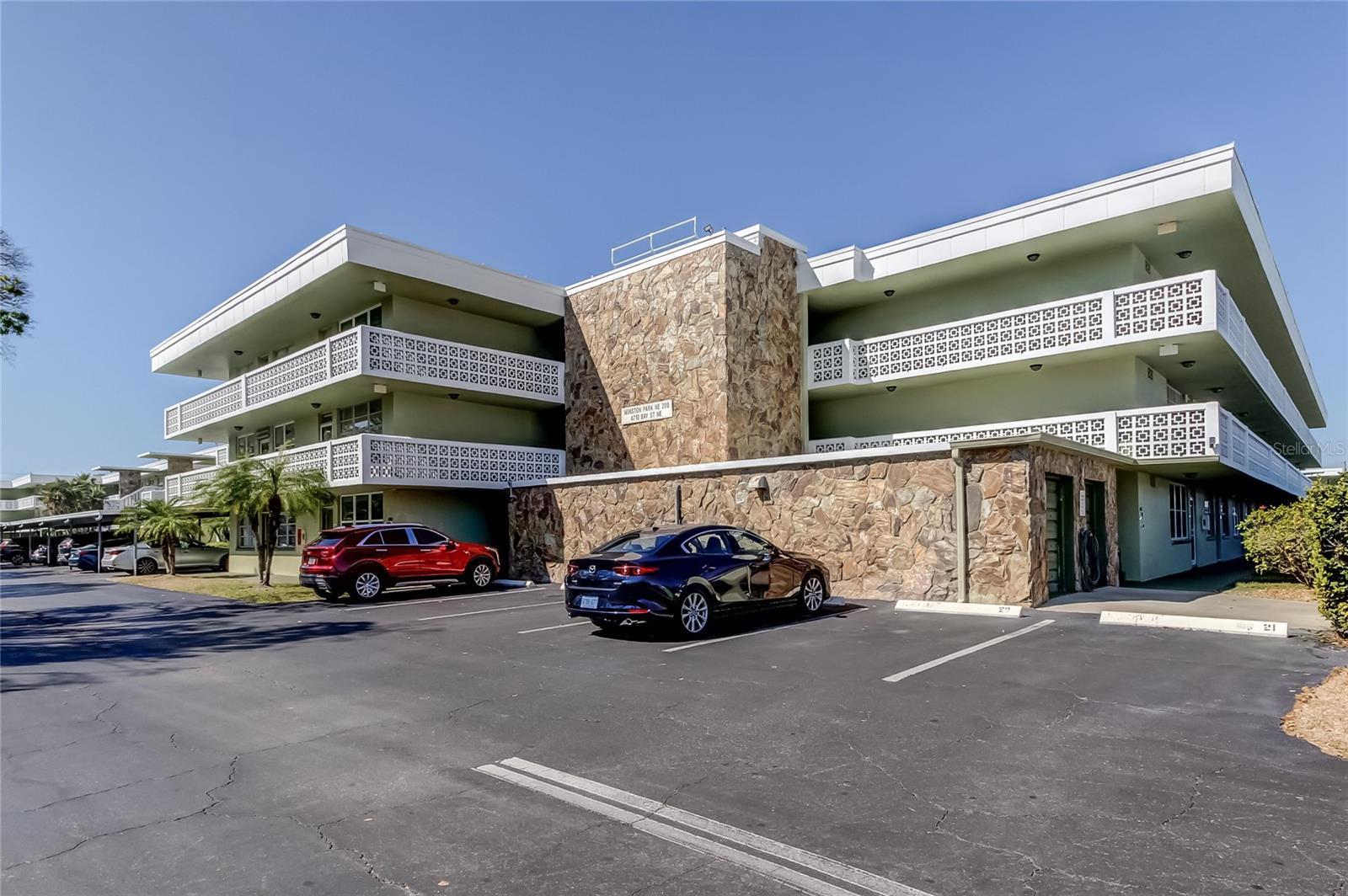 Welcome to affordable living in the desirable 55+ community of Winston Park NE. This third-floor condominium offers a wonderful opportunity to make it your own and is being sold As-Is. The appliances, HVAC system, water heater, and electrical panel will all convey in their current condition, making this an excellent option for buyers looking to update and personalize their new home.  The unit includes the convenience of covered Carport #67 and is located in one of St. Petersburg's most active and welcoming condominium communities. Residents enjoy a beautifully landscaped courtyard,a community pool, shuffleboard courts, clubhouse, and a full calendar of social activities. The community has completed both its Milestone Inspection and Reserve Study, providing added peace of mind. Leasing is permitted after one year of ownership.  Ideally located in Northeast St. Petersburg, you'll be just 10 minutes from vibrant downtown St. Petersburg and within walking distance of Whole Foods and Publix. Trader Joe's, Fresh Kitchen, Rollin' Oats, the YMCA, and two nearby golf courses are all just minutes away. Tampa International Airport is approximately 13 miles away, making travel convenient.