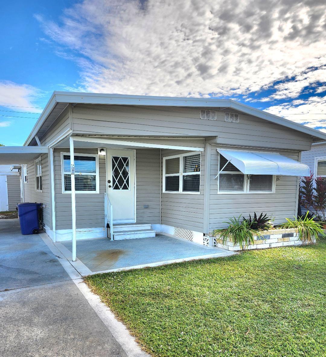 PRICED TO SELL IN PARADISE! Completely Move In Ready! Looking for an affordable Florida getaway, investment or full-time retreat, this is a Two Bedroom, One and a Half Bath Mobile Home in the highly desired, active 55+ Trailer Estates community. Newly updated Kitchen cabinets. New luxury vinyl floors throughout. Updated bath vanity cabinets and new shower. Master Bedroom has ensuite Bath. Second bedroom has great closet space! Utility room with washer and dryer. New electrical panel. Newer windows and vinyl siding. 8 x 9 Shed/Workshop. WDO tented 2023. Sold furnished. You own the land. No lot rent, Park Fees are included into annual real estate taxes. Boaters have direct access to Sarasota Bay from the Marina. Trailer Estates community offers so many options for a great day! Enjoy the large, heated community pool, hot tub, gym and wood shop. The community buzzes with pickleball, shuffleboard, kayaking, horseshoes, bocce, dancing and more. A US Post Office on site. 10 minutes to the SRQ Airport. Convenient to shopping, restaurants, the Arts and everything in Bradenton/Sarasota. Bring offers!