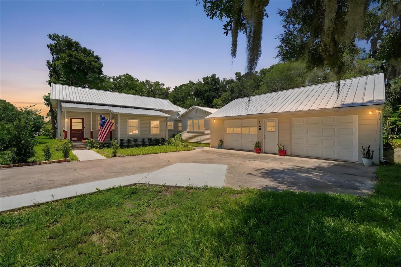 Some homes check boxes. This one changes plans. Sitting on a commanding .69-acre corner lot in the heart of Lake Helen, 128 N Lakeview Drive is a fully remodeled 4-bedroom, 3-bathroom home that delivers the kind of space, flexibility, and quality that buyers in this market are actively hunting for and rarely finding at this price.
Every inch of this home has been touched. New finishes, floors, updated bathrooms, a kitchen built for real life, and a layout that actually flows. Plus, roof is 3 years young! The main home lives large, but the real story here is the private mother-in-law suite. Use it for rental income, house an older kid who needs space but not a lease, bring the in-laws in without anyone losing their mind, or simply hold it as a flex space that adds value. That kind of built-in versatility does not happen by accident. 
Step outside and the lot does the talking. Two-thirds of an acre of corner lot gives you room to breathe, room to park, and room to live... maybe even a pool down the road. The detached 2-car garage doubles as a workshop, a storage solution, or a man cave depending on who is asking. In Lake Helen, where lots this size are getting harder to find and harder to keep, this property stands on its own.
This is a fully reimagined home in one of Volusia County's most underrated communities, with the kind of income potential and lifestyle flexibility that buyers spend months looking for. The ones who move fast on properties like this are the ones who get them. Schedule your private tour today, times are limited.