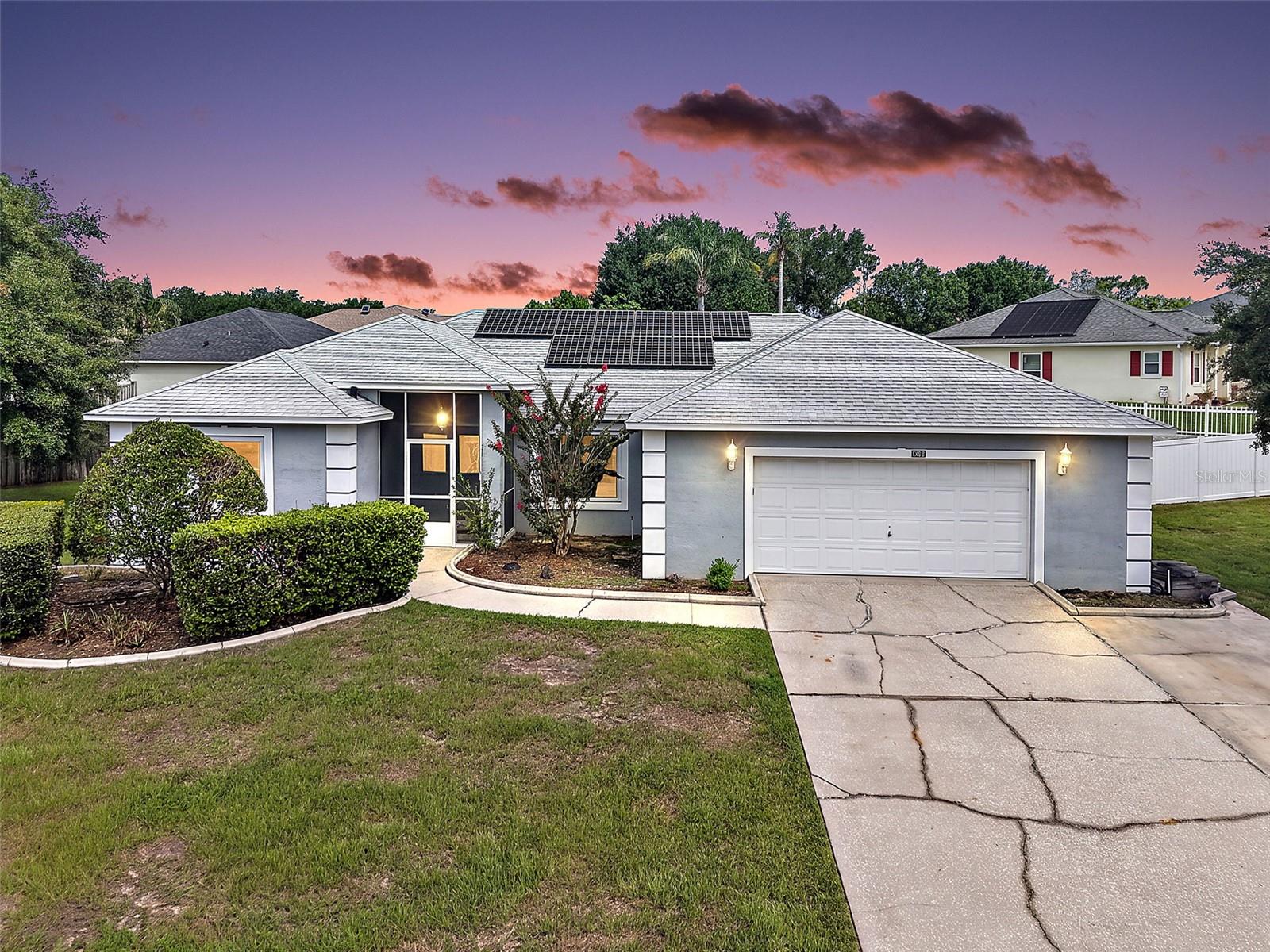 Enjoy the best of Florida living in this spacious 3-bedroom, 2-bath pool home situated on nearly one-third of an acre. The fully fenced backyard creates a private retreat, complete with a screened lanai and sparkling pool—perfect for relaxing, entertaining, or enjoying year-round sunshine. Designed with both comfort and efficiency in mind, this home features fully owned solar panels, energy-efficient windows, and a newer roof. Inside, you’ll find a functional layout with a combination of ceramic tile, vinyl flooring, and carpet throughout, offering versatility for a variety of lifestyles. The generous lot provides ample space for outdoor activities, pets, gardening, or simply enjoying the extra elbow room. Well cared for and ready for its next chapter, this home offers the opportunity to move right in while adding your own personal style over time. With a very low HOA and a desirable setting, this property delivers the space, privacy, and Florida lifestyle you’ve been looking for.