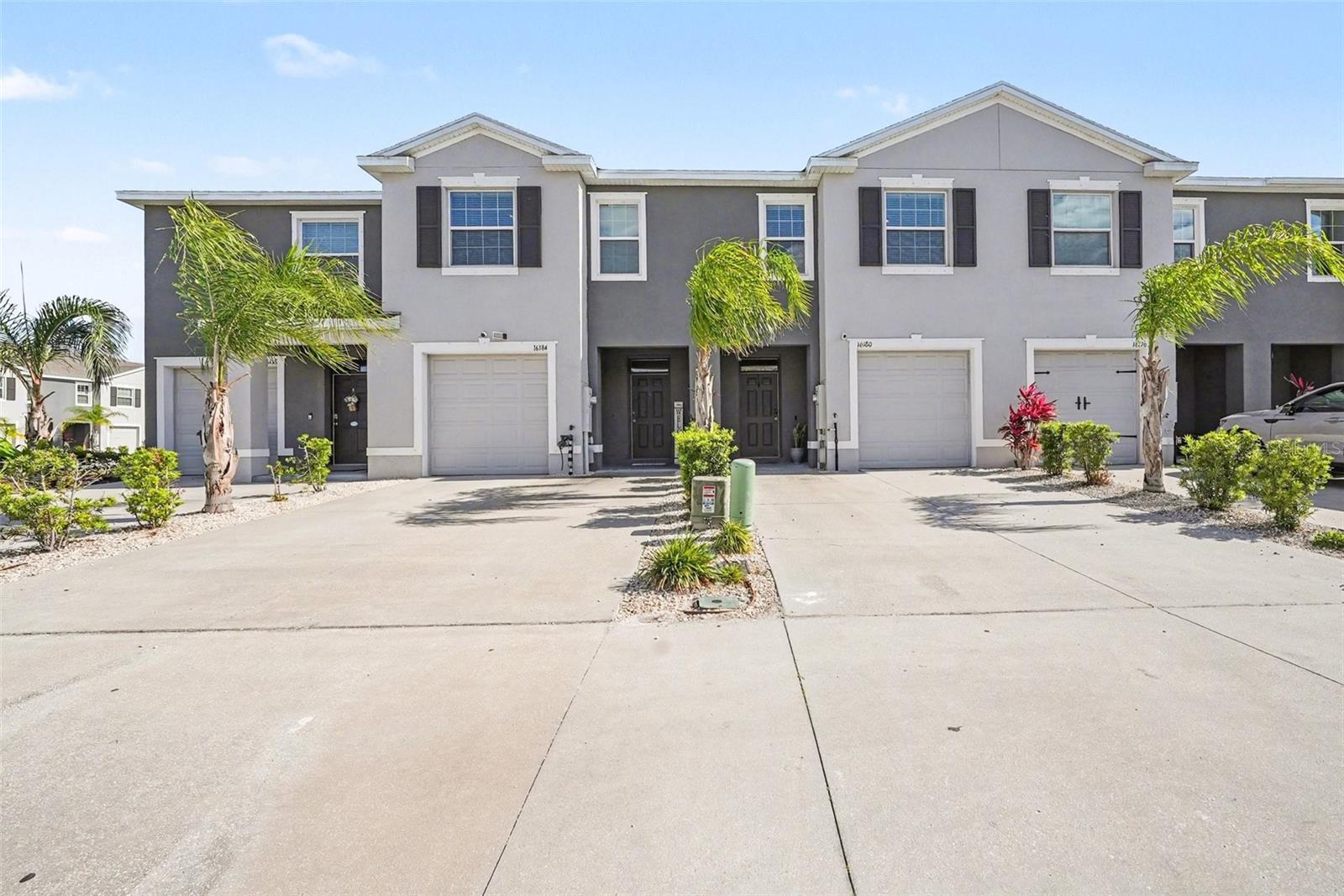 MOVE-IN READY IN ODESSA! Built in 2021, this beautifully maintained 3-bedroom, 2.5-bath townhome offers 1,673 square feet of bright, open-concept living in the desirable community of The Preserve. The main level features high ceilings, tile flooring, and a spacious layout ideal for everyday living and entertaining.

The modern kitchen is the heart of the home, complete with granite countertops, stainless steel appliances, a large center island with breakfast-bar seating, and a walk-in pantry. The kitchen flows seamlessly into the dining and living areas, while sliding glass doors lead to a covered lanai—perfect for relaxing, outdoor dining, or enjoying Florida’s year-round sunshine.

Upstairs, the spacious primary suite features a private en-suite bathroom and a generous walk-in closet. Two additional bedrooms provide plenty of space for family, guests, or a home office. Additional highlights include an upstairs laundry area, smart-home technology, hurricane shutters, window treatments, an attached one-car garage, and additional driveway parking.

Enjoy low-maintenance living with grounds maintenance included through the HOA, plus access to community amenities including a swimming pool, clubhouse, fitness center, playground, and recreational areas. Conveniently located near SR 54 and the Suncoast Parkway, offering easy access to shopping, dining, schools, medical facilities, Tampa, and the Gulf Coast. FHA, VA, conventional, and cash buyers are welcome. Schedule your private showing today and make this beautiful Odessa townhome your new home!