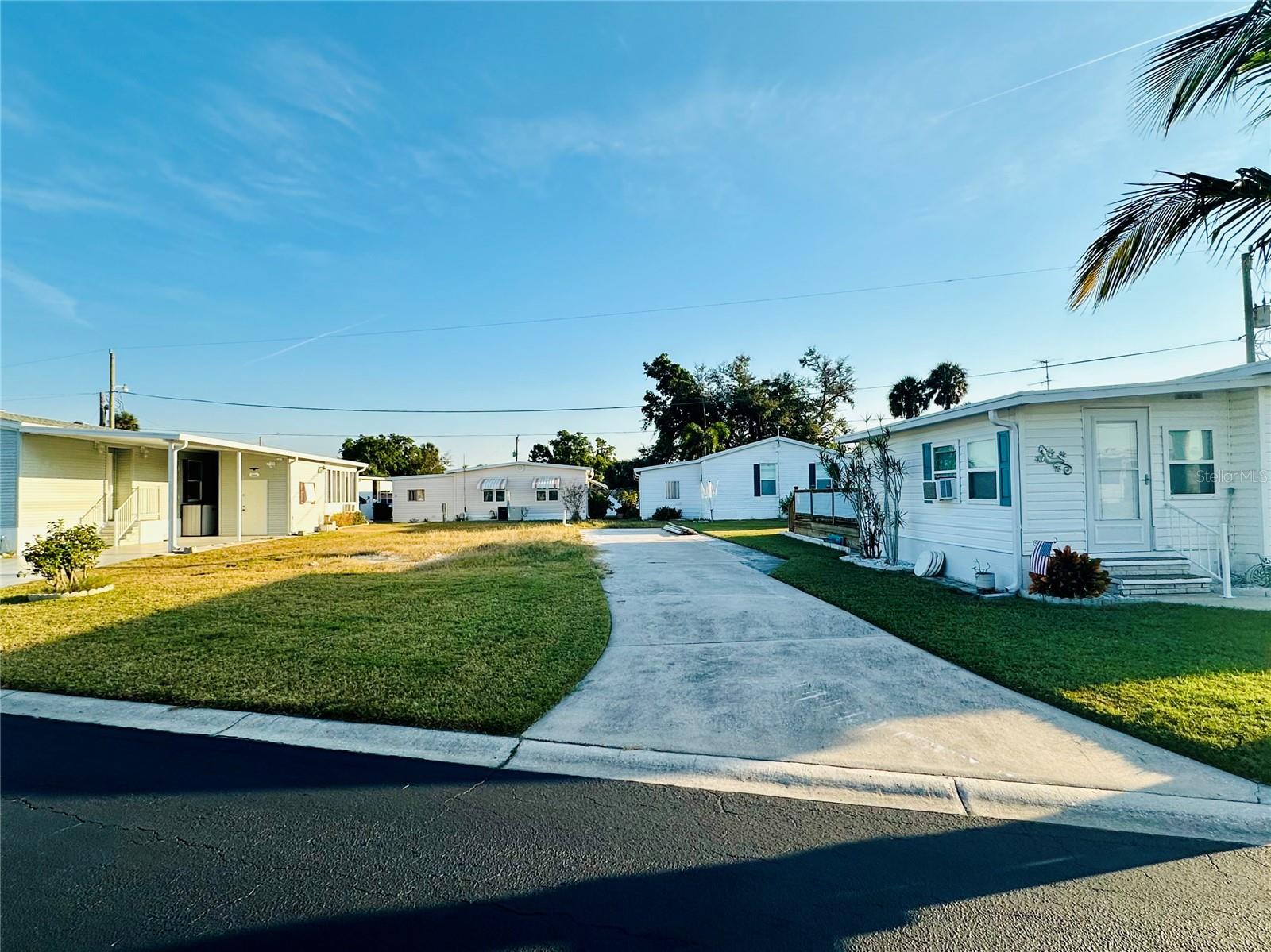 Welcome home to this spacious VACANT LOT in the PET ZONE of the highly sought after Leisure Lakes, 55+ community! This active community features 2 clubhouses, swimming pool, pickleball courts, shuffle board, bocce ball and a fitness center that has several free classes and lots of activities. Leisure Lakes is a member owned co op where owners own their lot,  is located in the pet allowed area where you can have up to 2 dogs with no size limits (some breed restrictions). Leisure Lakes is conveniently located near shopping, golf courses, major roadways, and the beautiful Florida beaches. Hurry on this one!!
